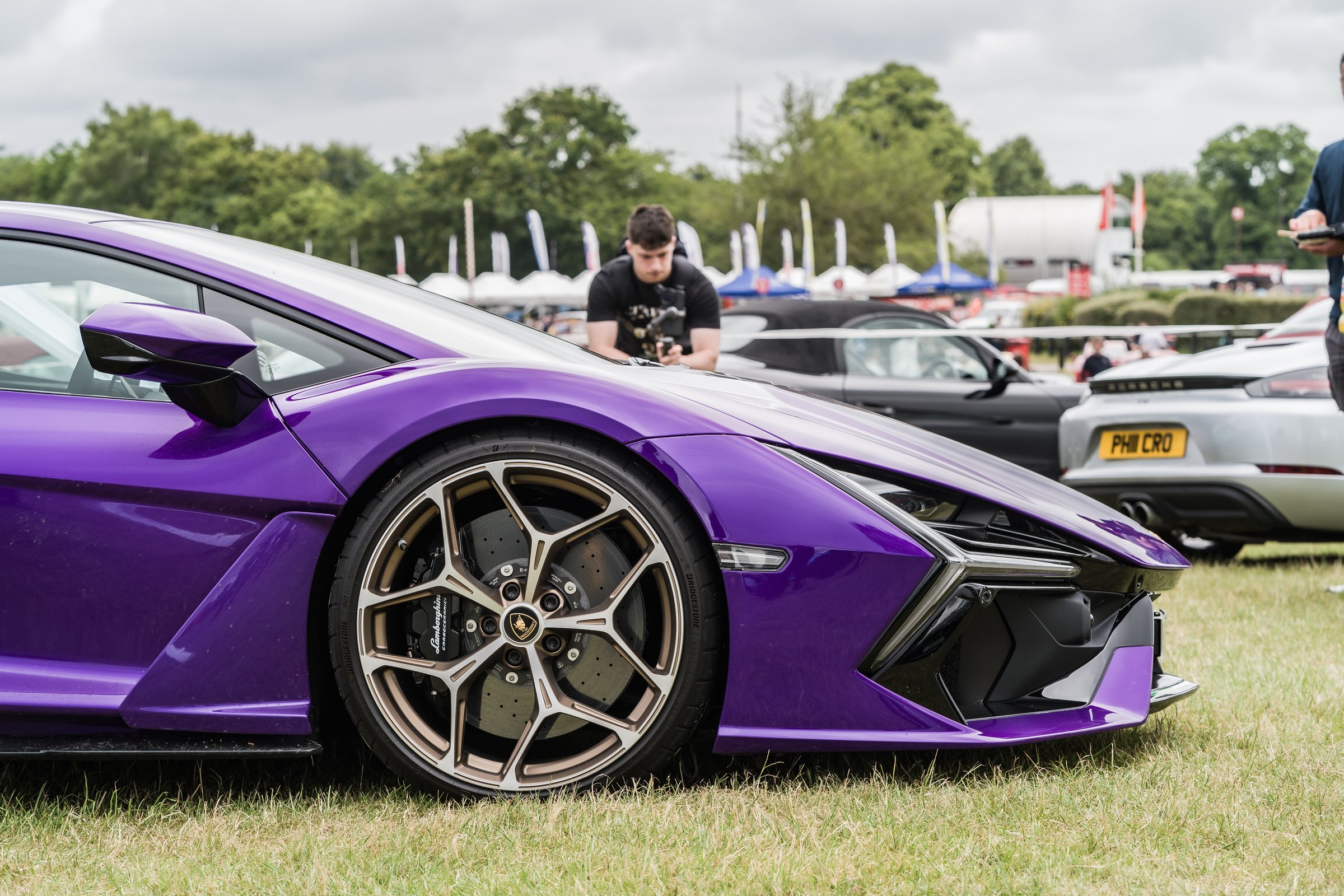 Tarporley, Cheshire, England, June 29th 2024. A side view close-up of a purple Lamborghini Revuelto alloy wheel.