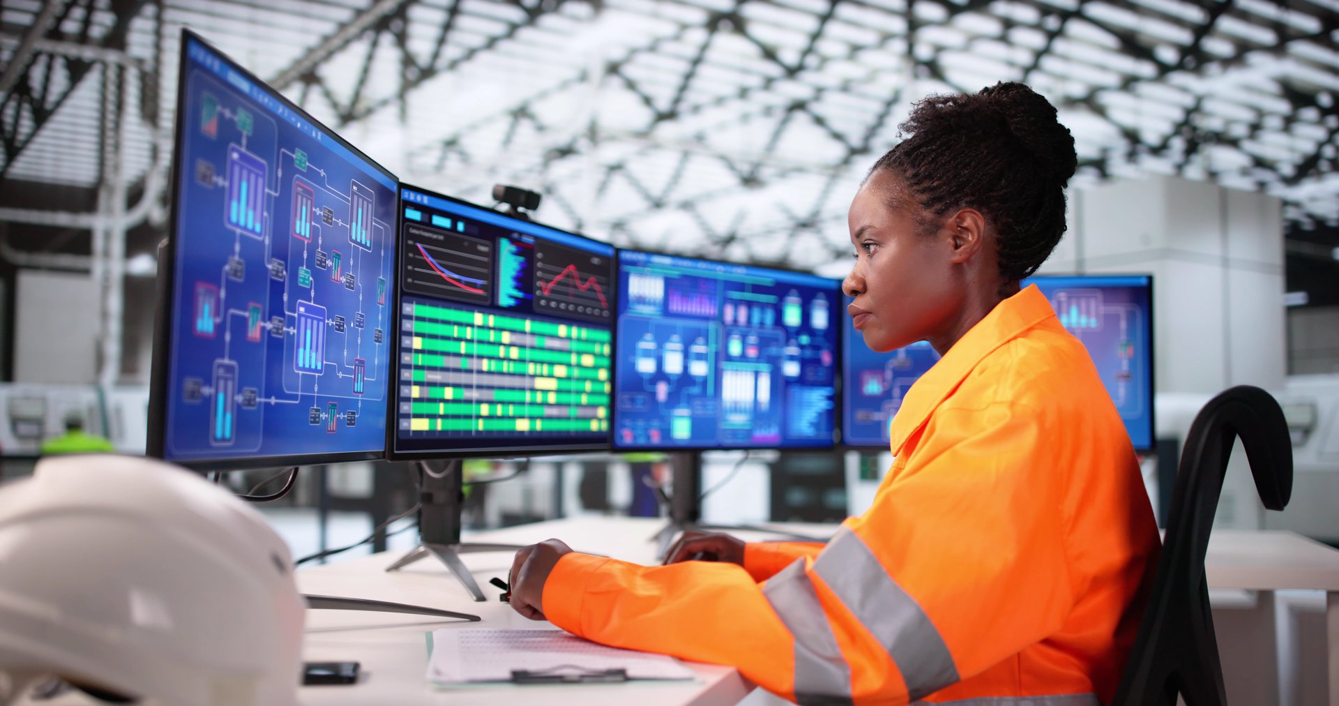 African American Woman Engineers New Automation System At Construction Site.