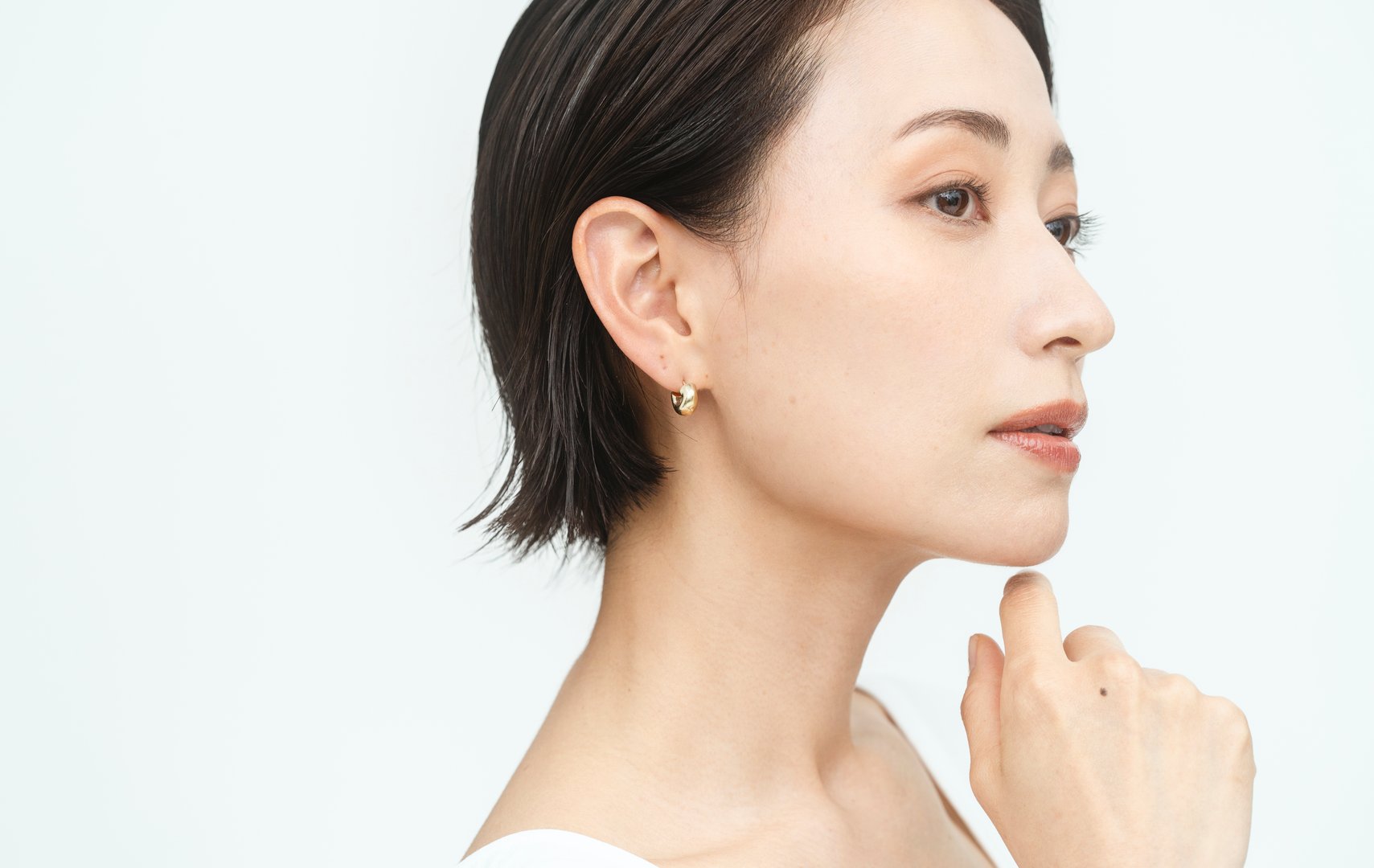 Profile of a beautiful Japanese woman.white background studio