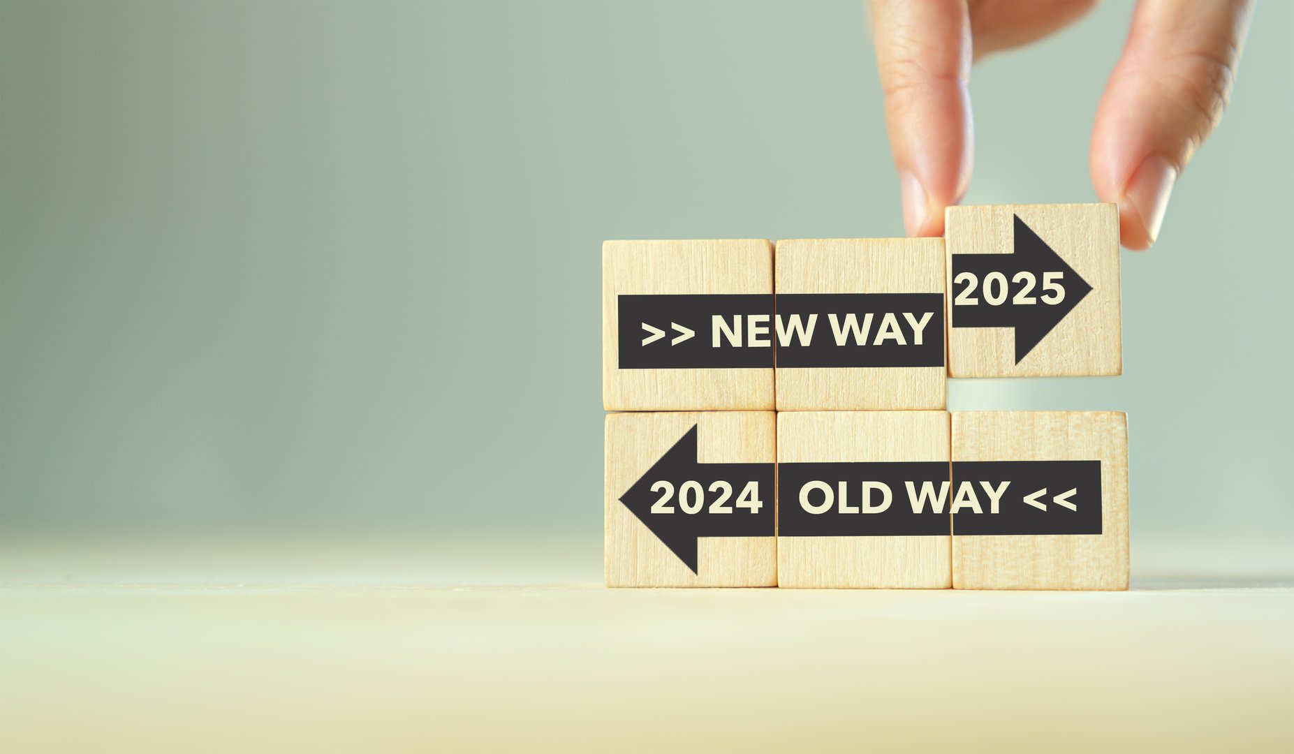 New way 2025 and old way 2024 approach to business resolution. Improvement, change management. Business disruption and survival. Business transformation. Holding 2025 for new way implementation.