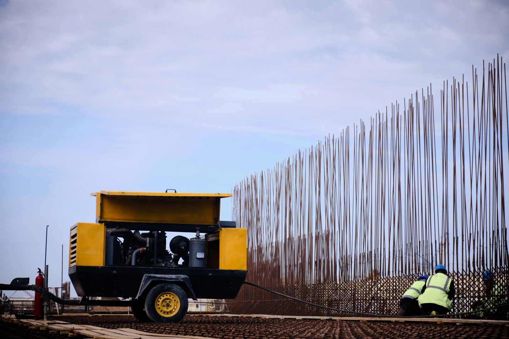 Mobile air compressor at construction site