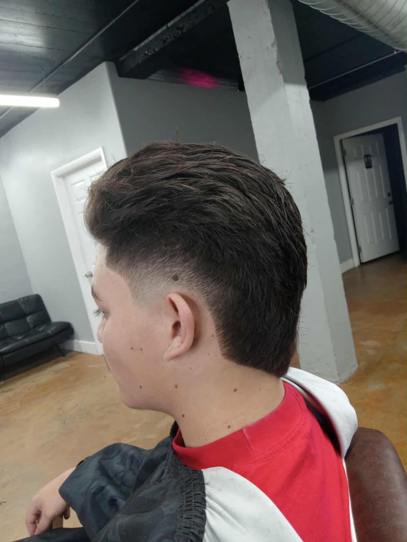 Austin Mitchell haircut