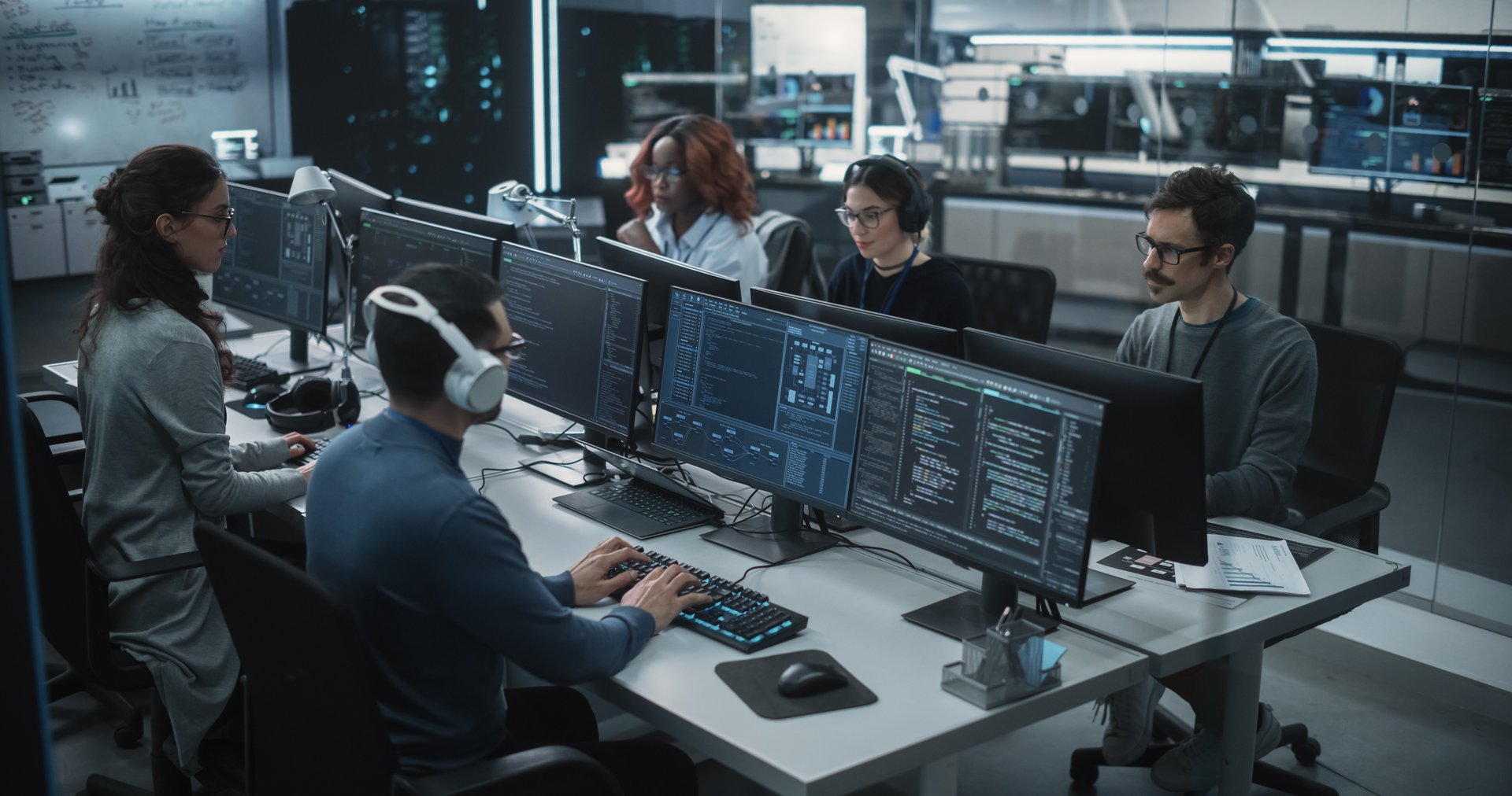 AIM CyberOps team of security experts collaborating