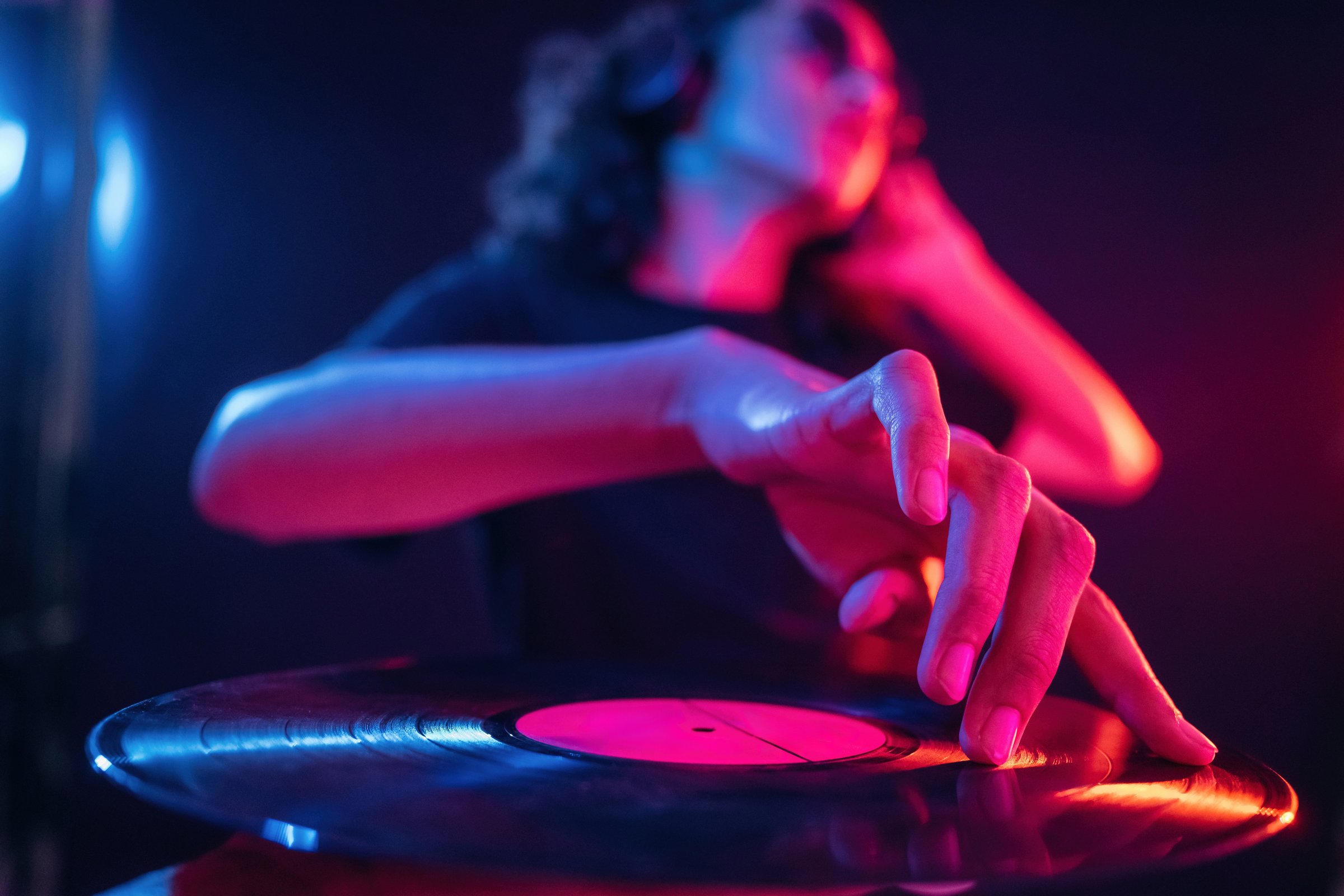 DJ mixing at night