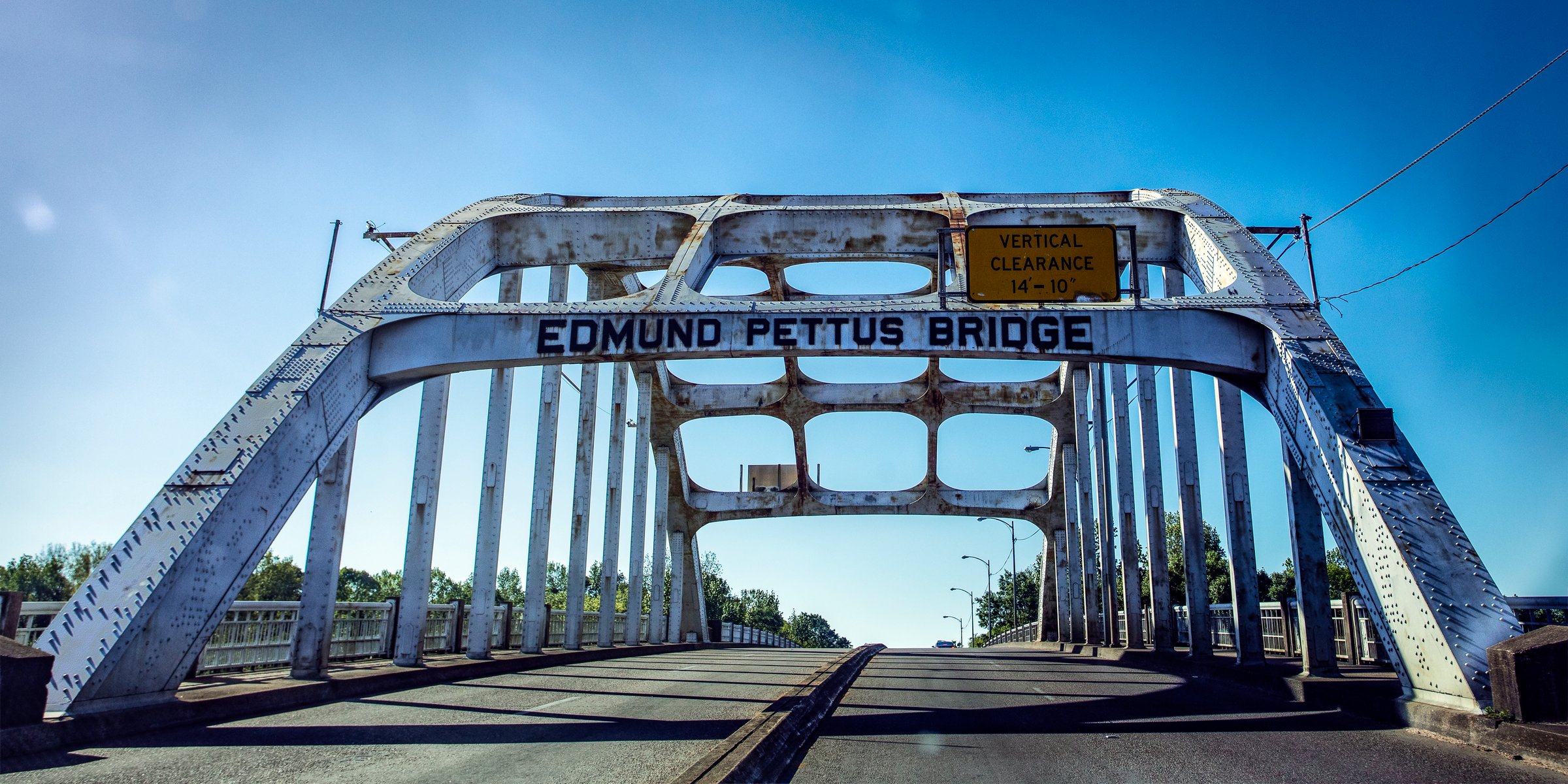 Edmund Pettus Bridge, Selma, Alabama, historic landmark, important to the Civil Rights Movement.  Photographed from a car while driving south, approaching the structure from the north.