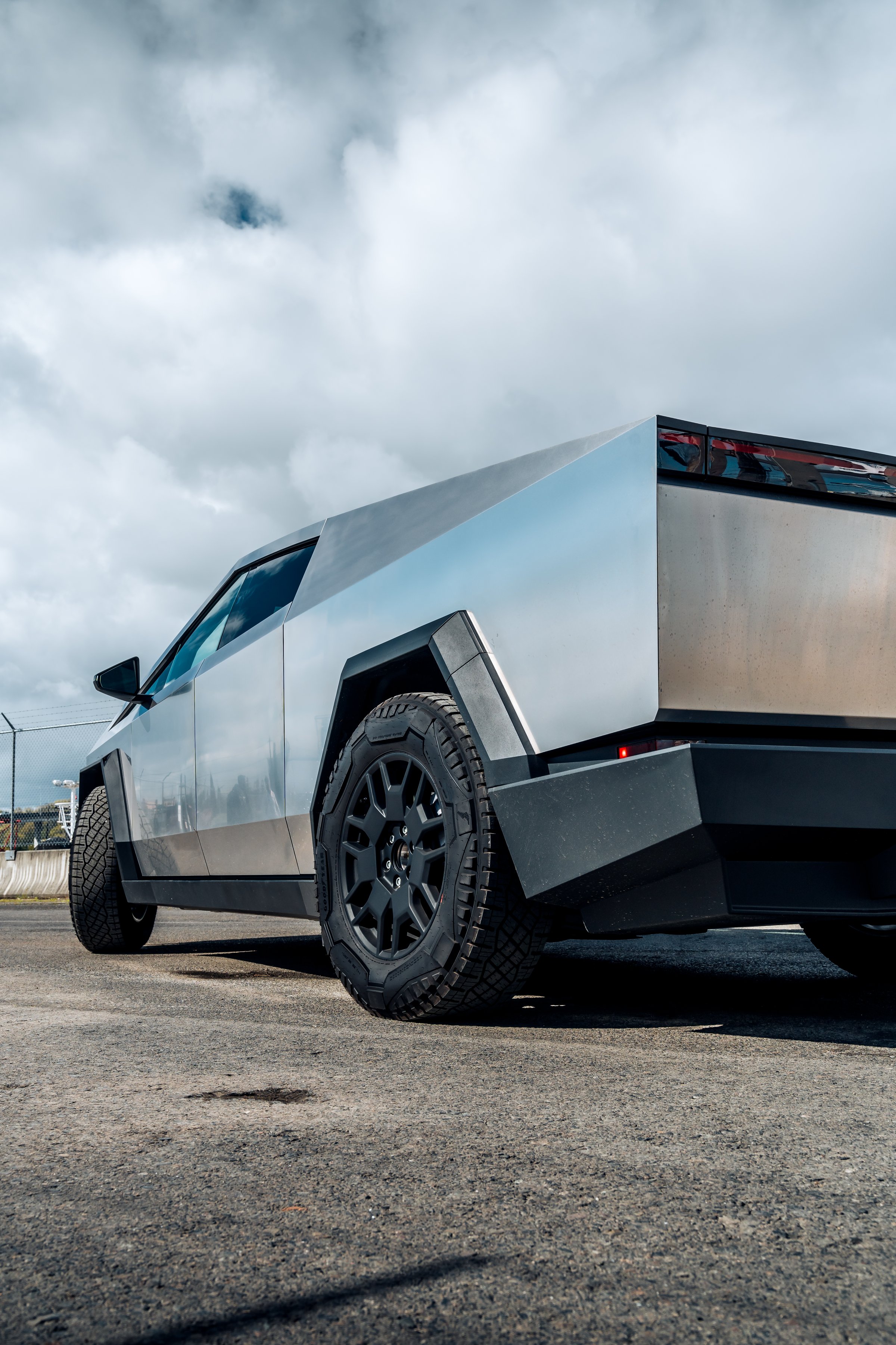 Tesla Cybertruck showing the drivers side rear wheel