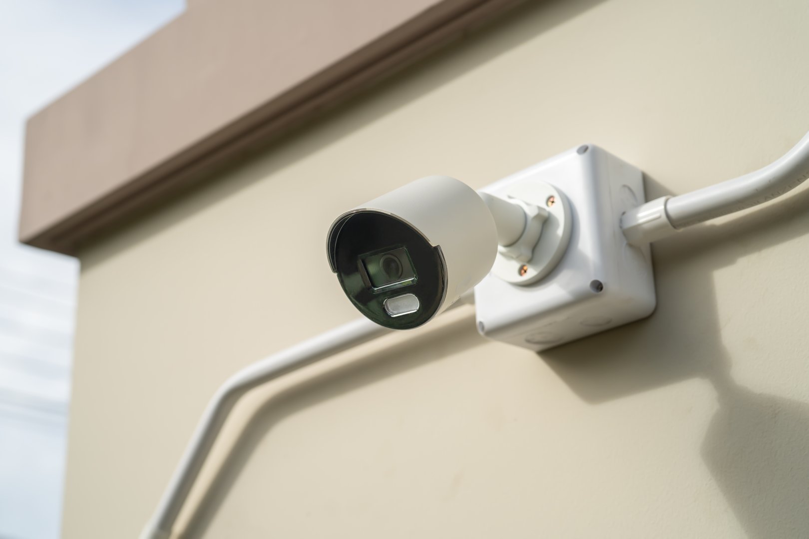 CCTV Closed circuit camera at wall house, security system concept.