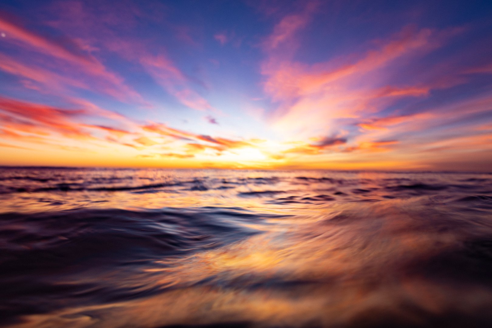 Dynamic Colorful Sunset Over Ocean WaterShot in Carlsbad, San Diego County, California.