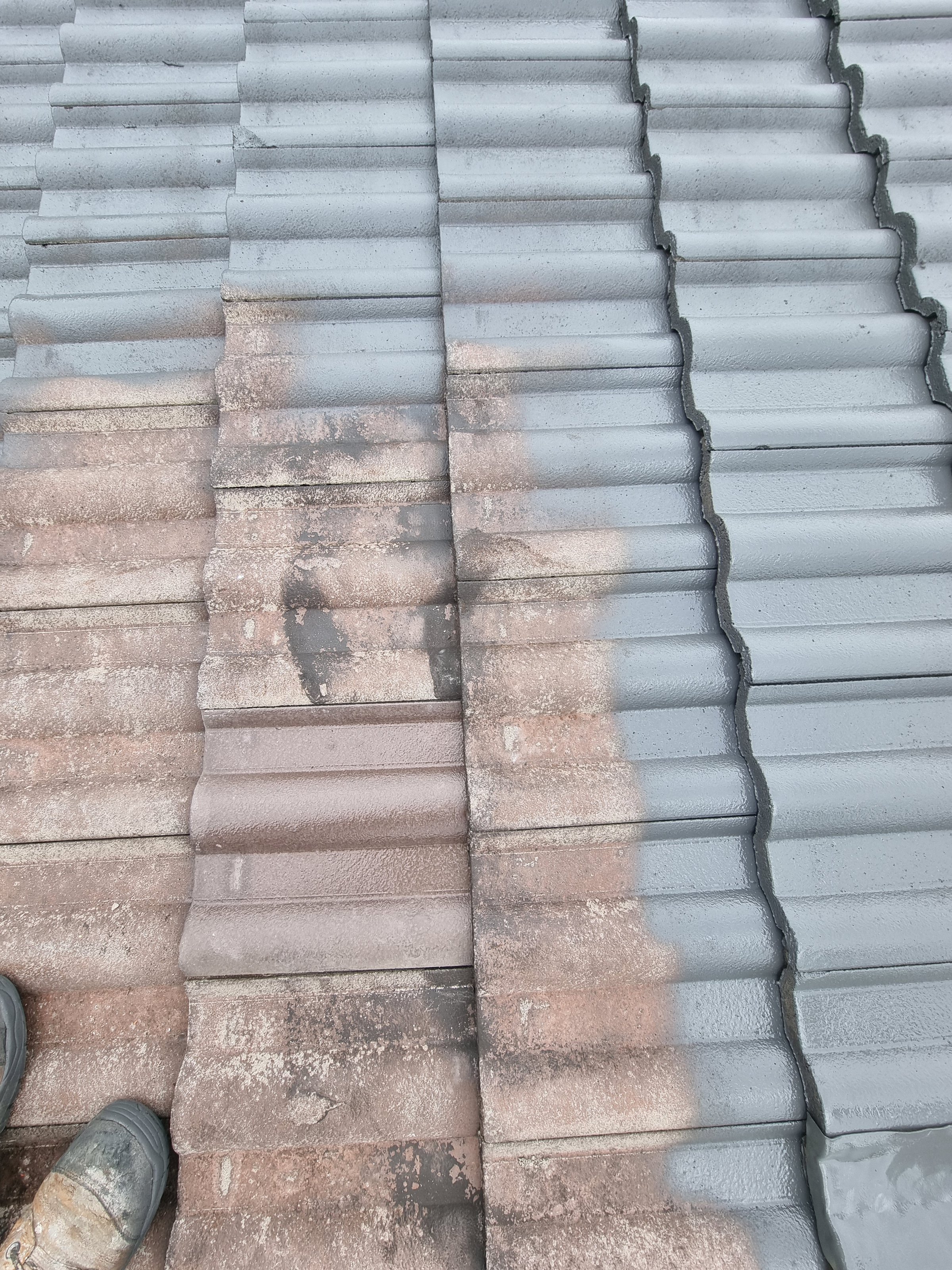 Quality Painting Group tile roof restoration project showing professional tile roof work