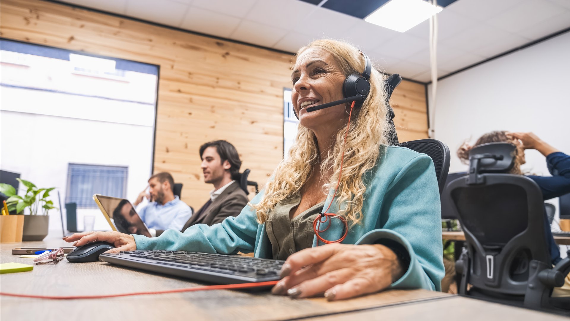 Smiling call center professional at work