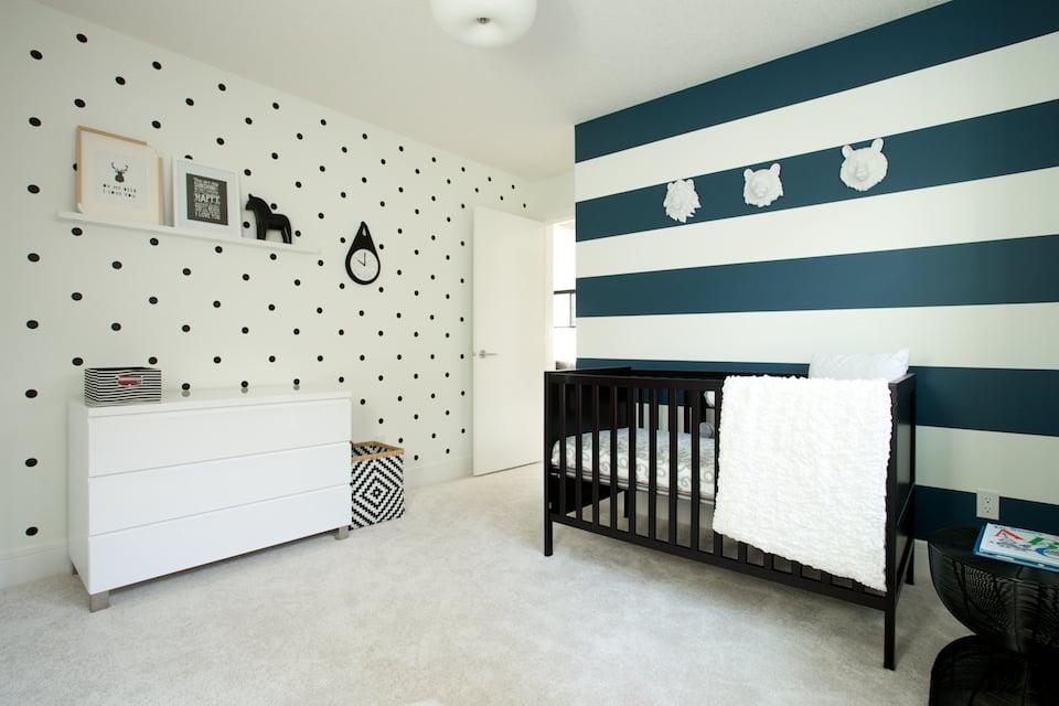 Cozy holiday bedroom with hot tea and cookies on a tray