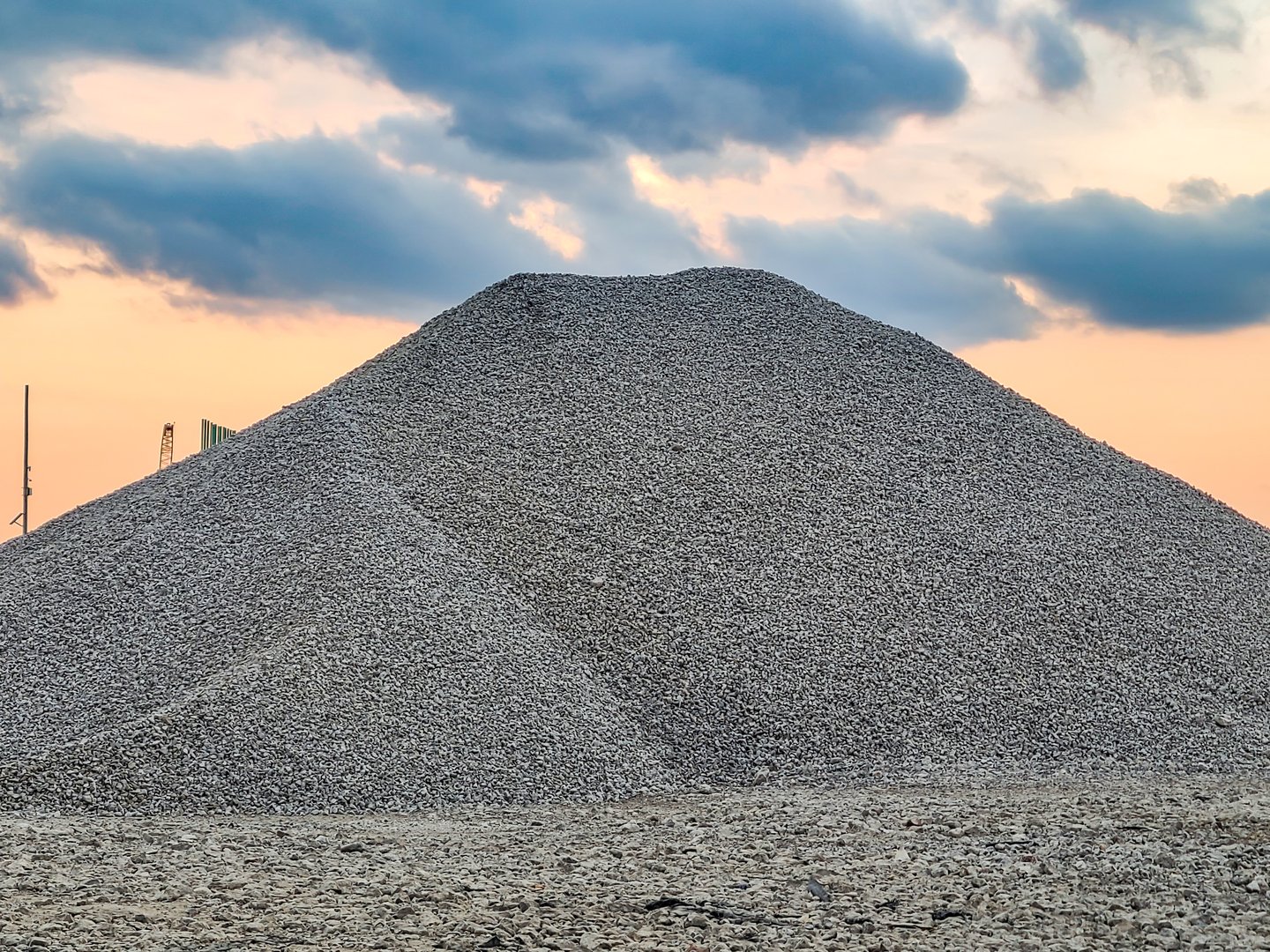 A pile of rock tailings (ggregate) at a construction site