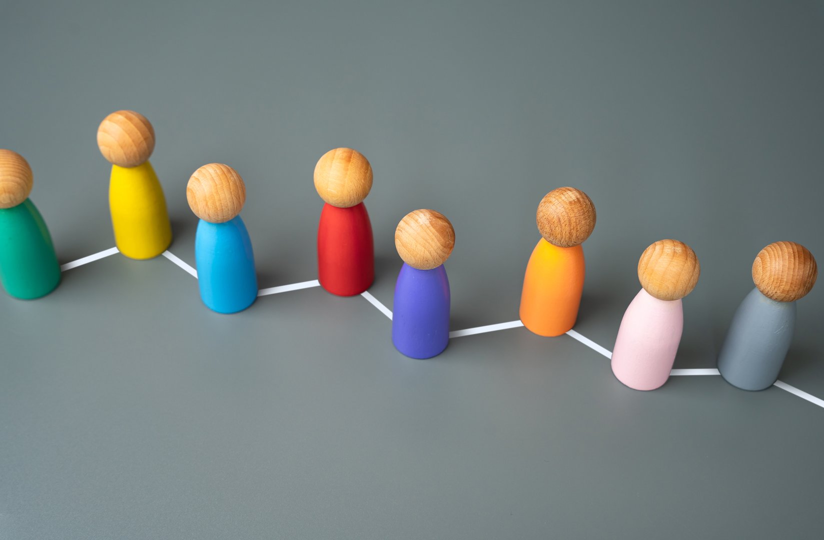 Connection between people. People connected by lines. Community and Social Networks. Collaborations and Partnerships. Teamwork and Cooperation. Cultural Exchange. Share knowledge. Social bonds