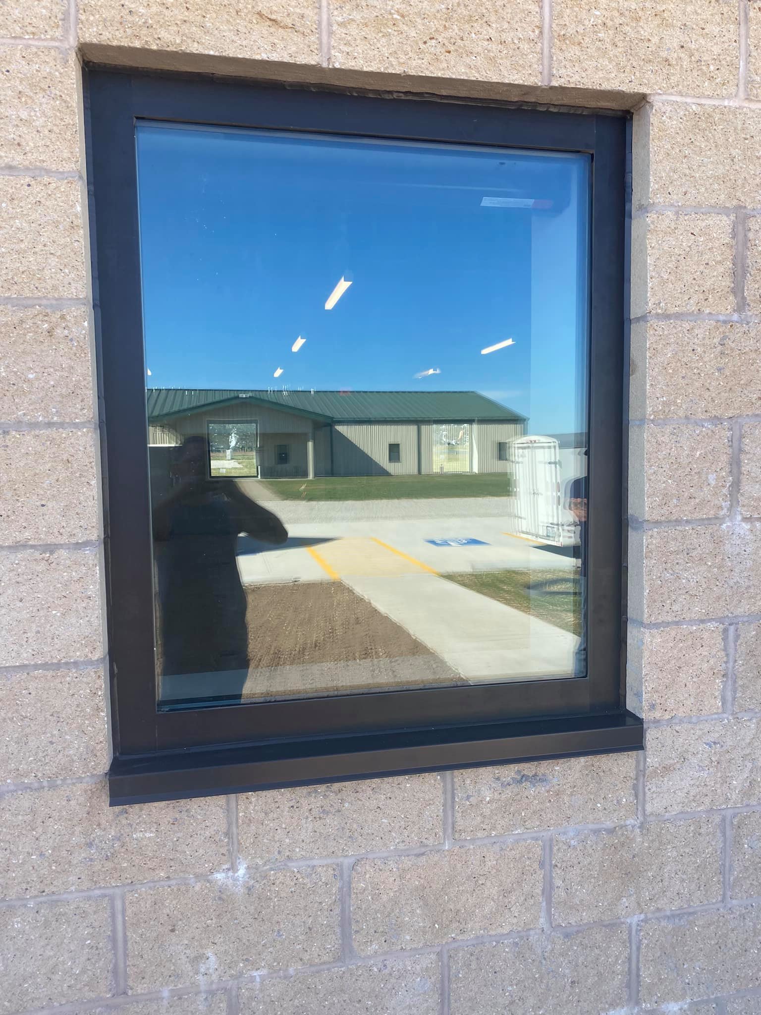 New construction FEMA building with storefront windows