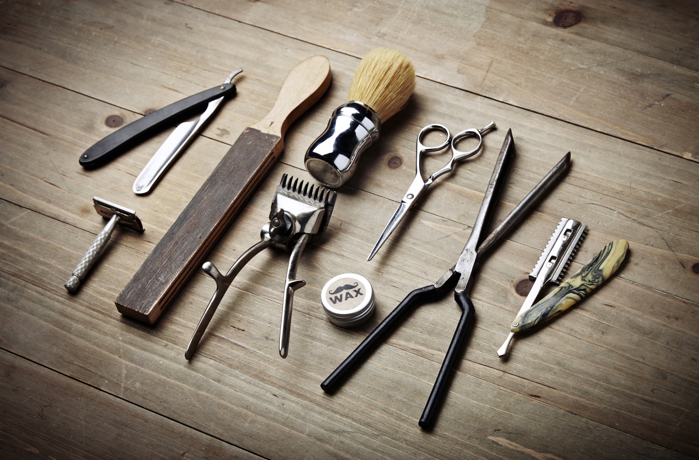 Vintage barber shop equipment on wood desk