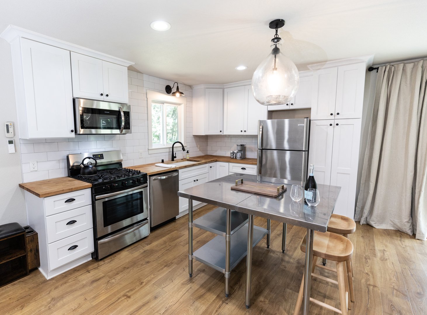 ADU kitchen with luxury finishes and custom cabinetry