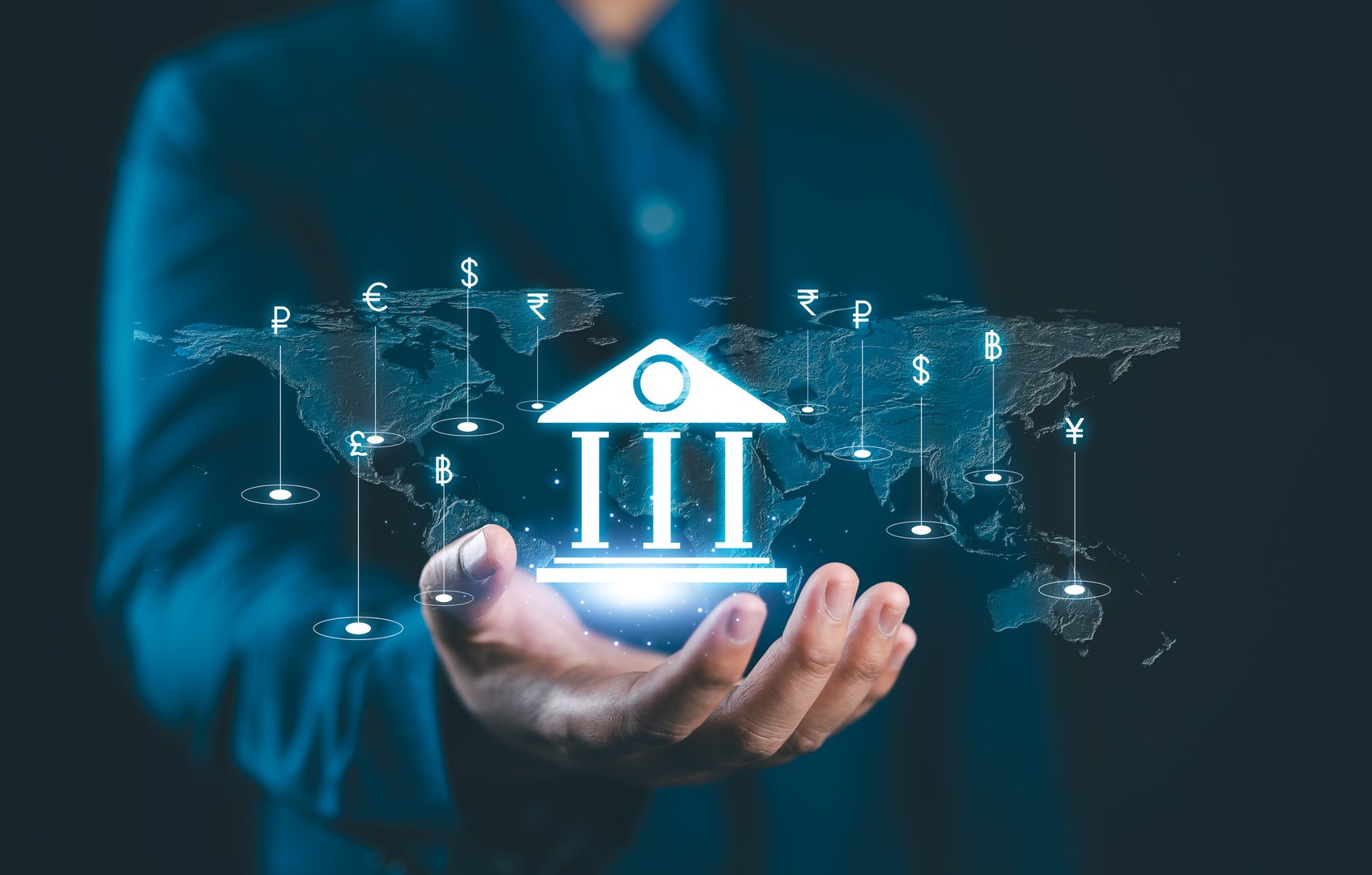 Global currency exchange concept with businessman holding virtual banking with international currencies