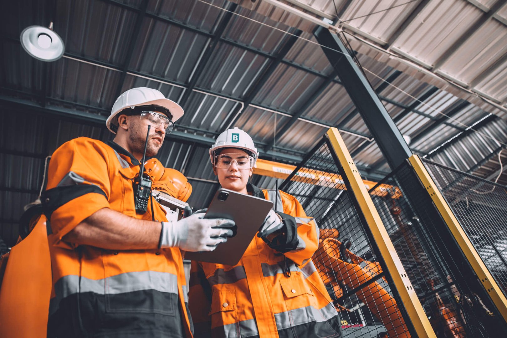Facility workers looking at tasks