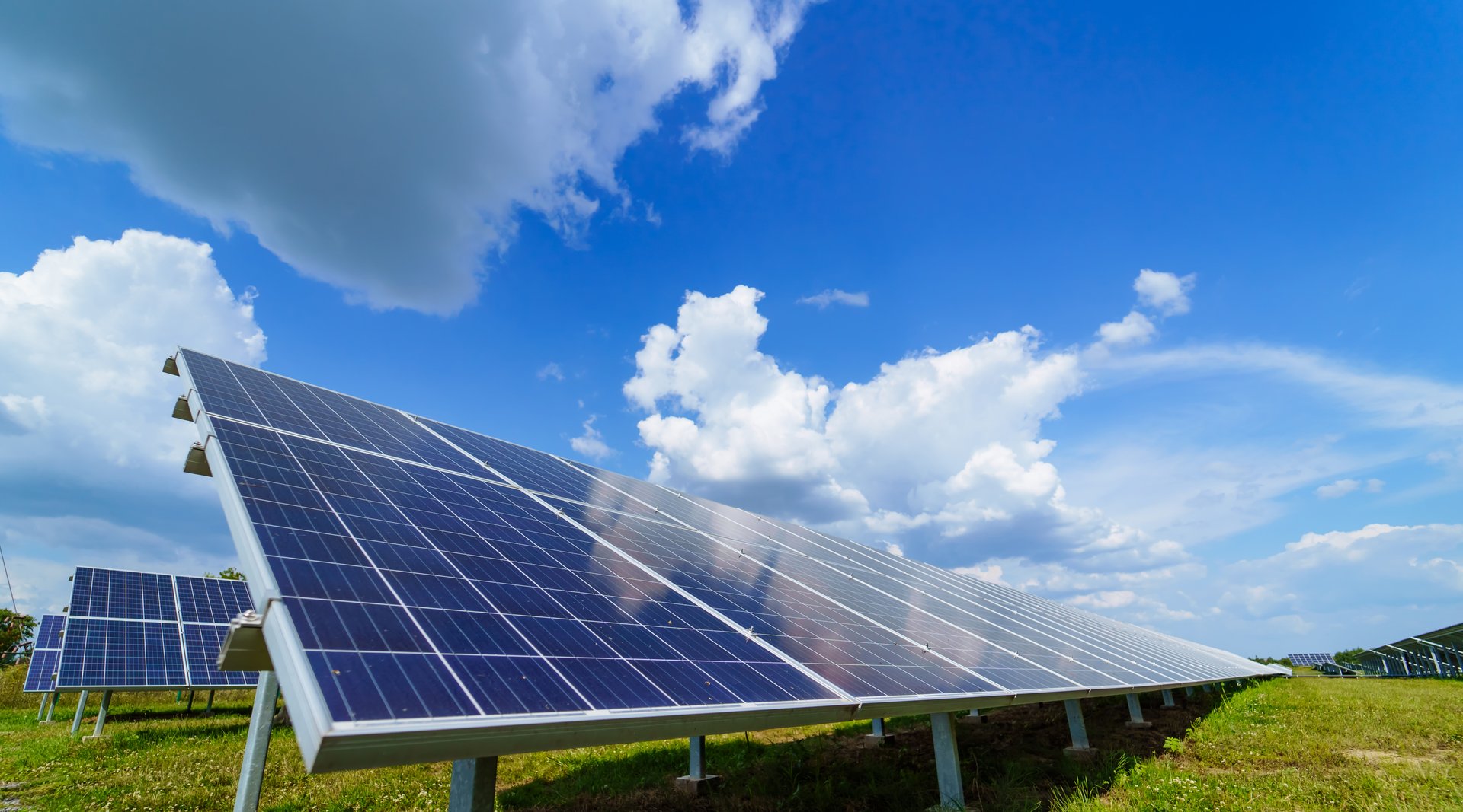 Modern ecology sun energy batteries. Solar panels field for electricity.