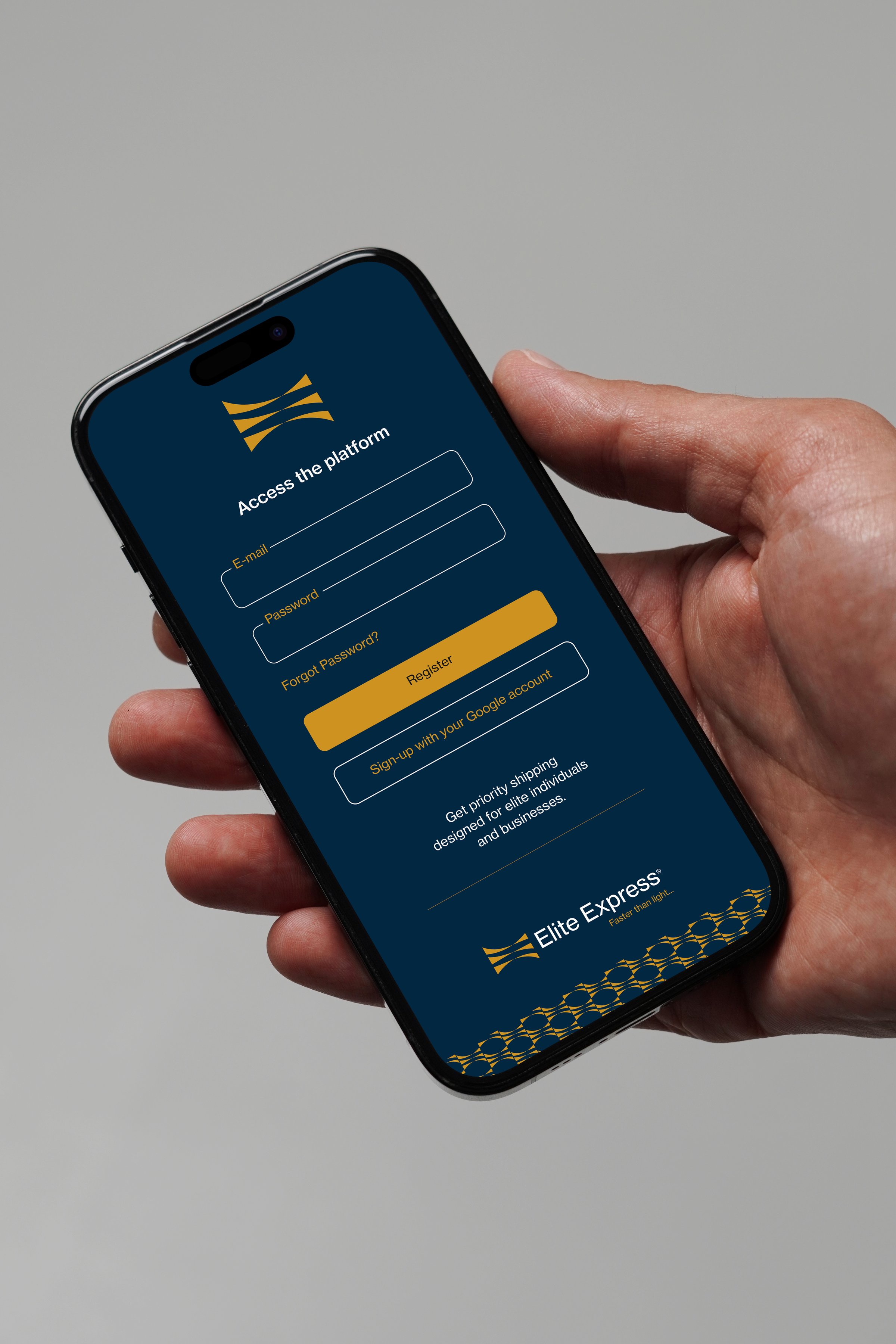 Hand holding a smartphone displaying a login screen for the Elite Express app with options to sign in or register.