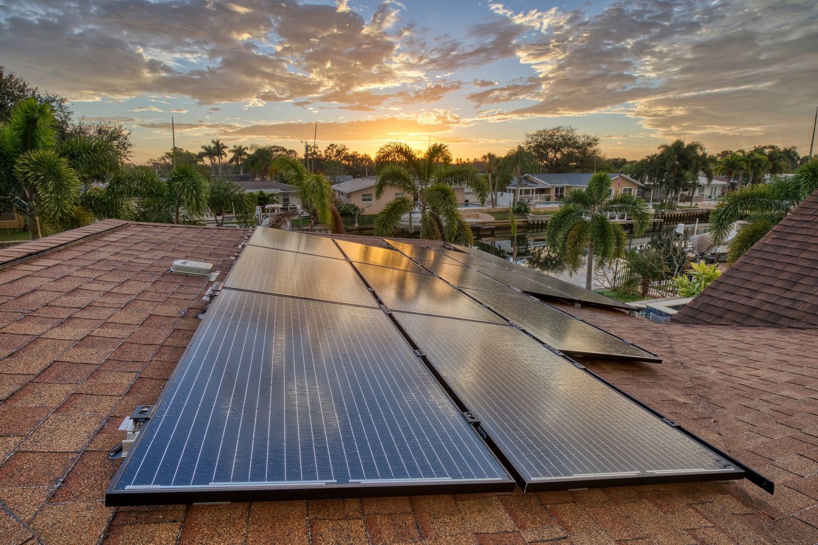 Solar panels on a residential house in Florida with the sun just starting to rise