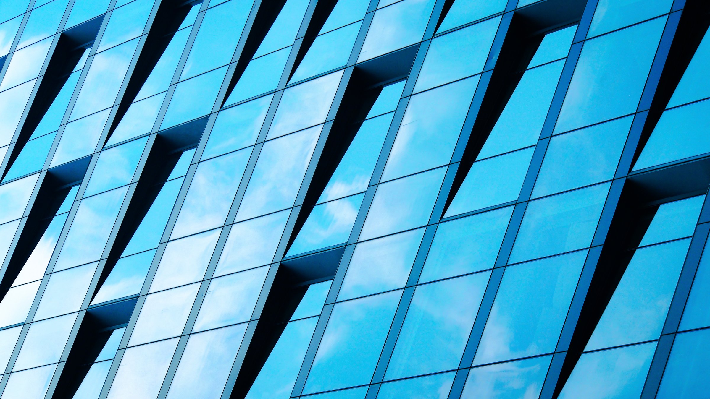 Dynamic Rhythms: Angular Reflections of Sky on Geometric Facades