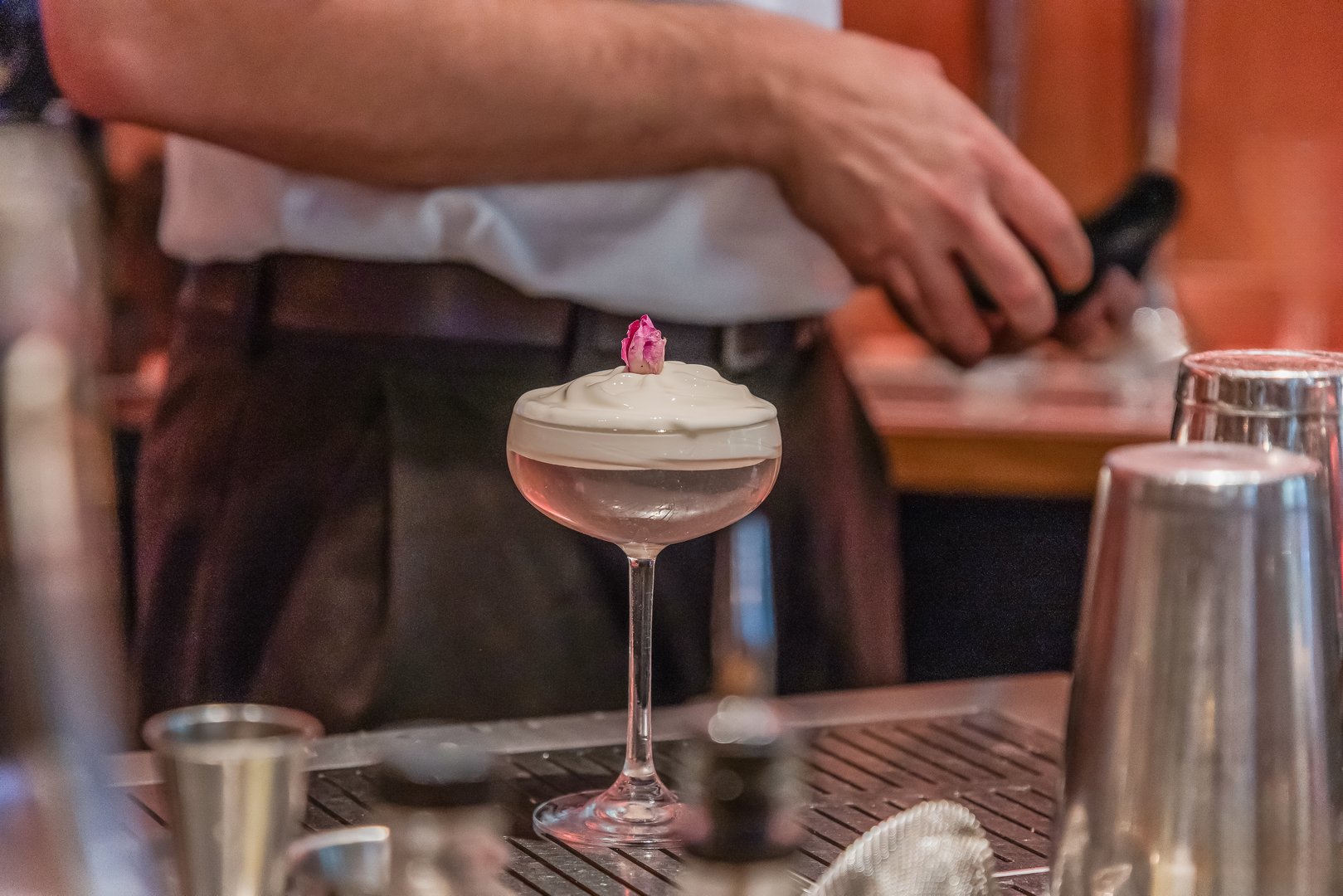 Bartender preparing a cocktail in an upscale bar