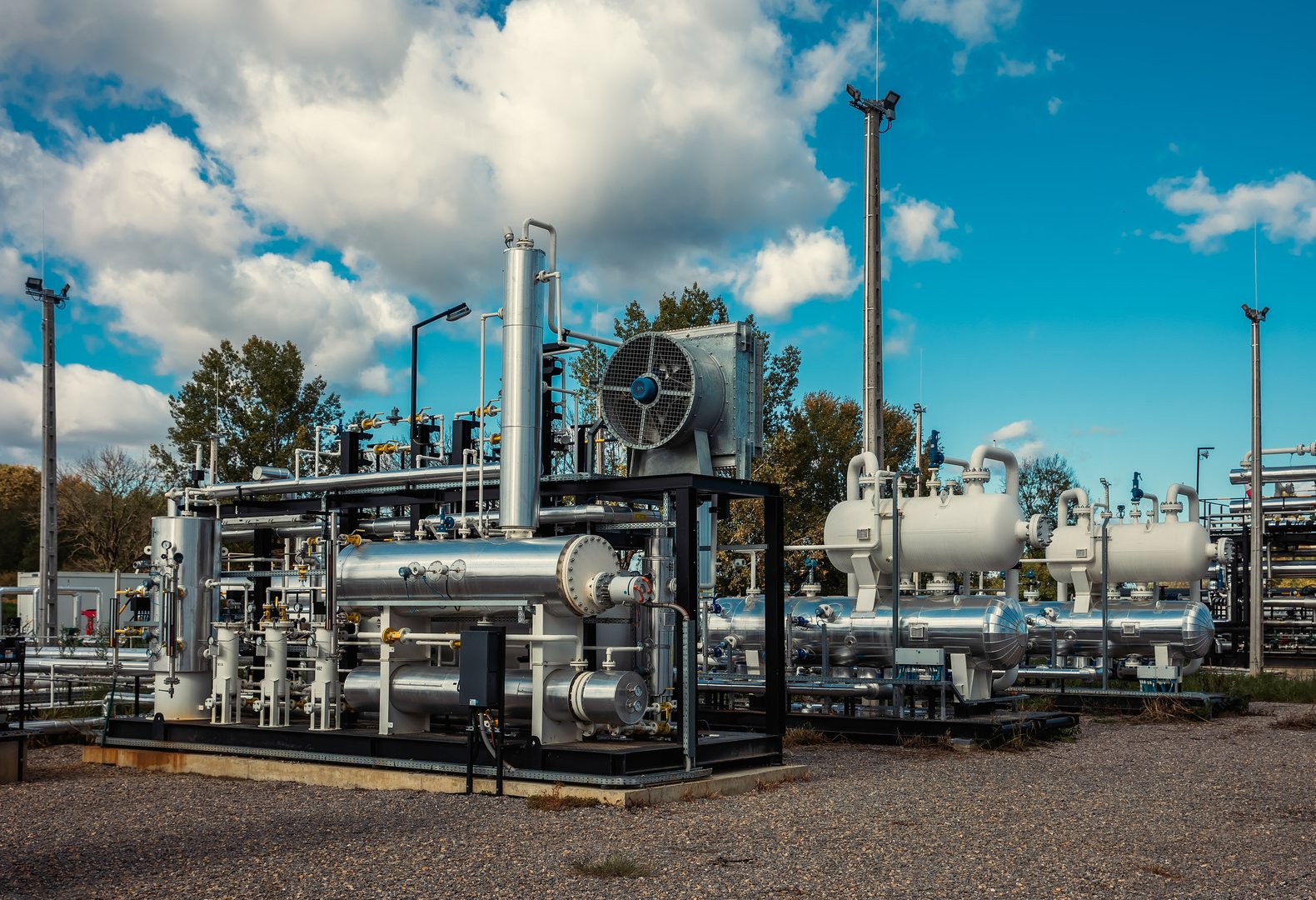 Storage tanks and pipes in oil industry facility