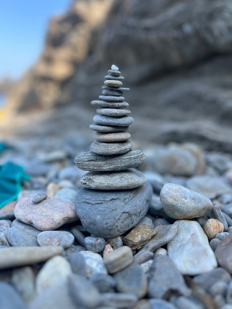 Small stone tower on a stone beach