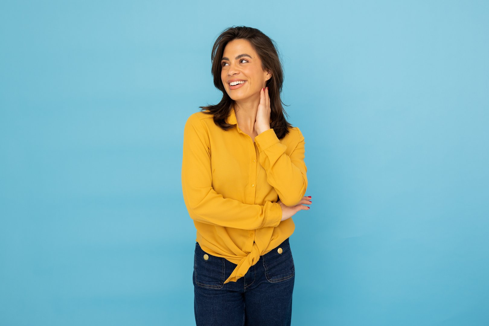 Focused Latina businesswoman with a positive expression