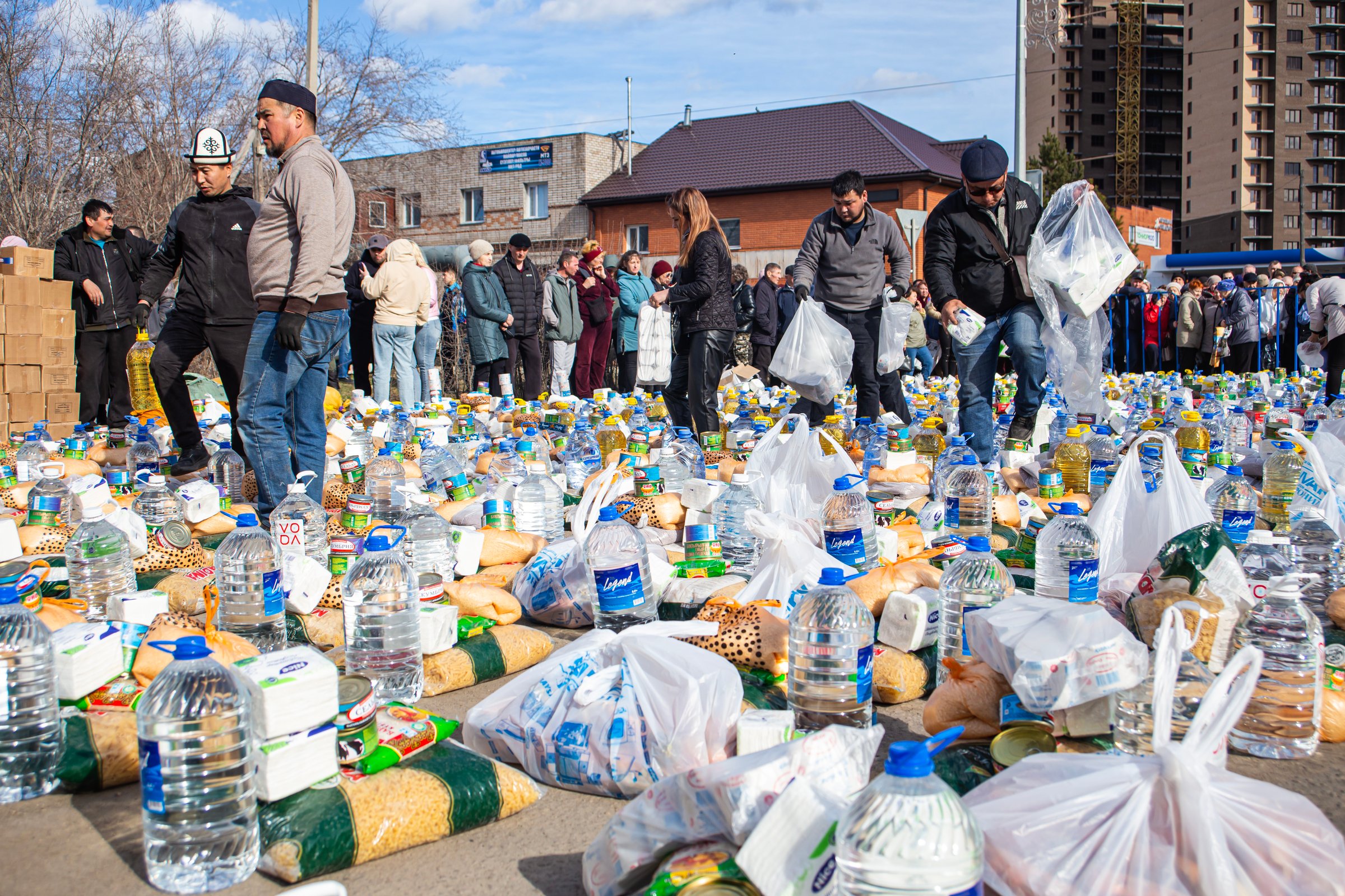 05 May 2024 Petropavlovsk Kazakhstan, People receiving humanitarian aid packages during an emergency situation under a dangerous situation regime