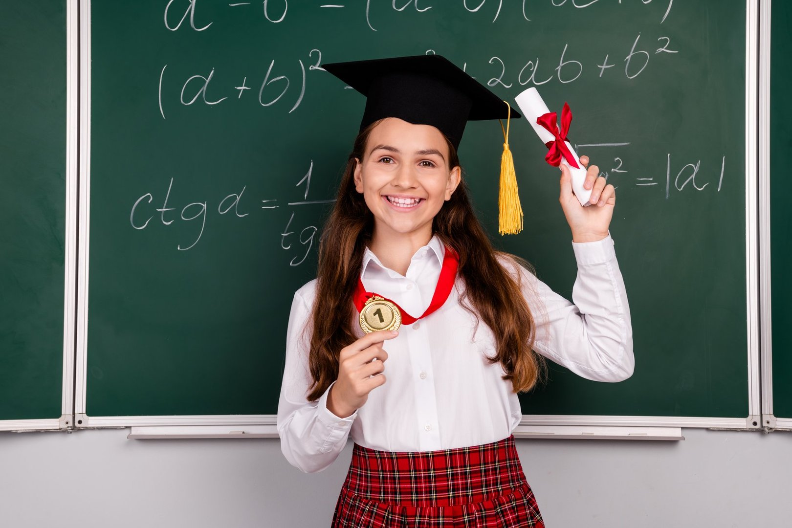 Photo of charming teen pupil girl graduation diploma golden medal wear trendy uniform classroom blackboard background.