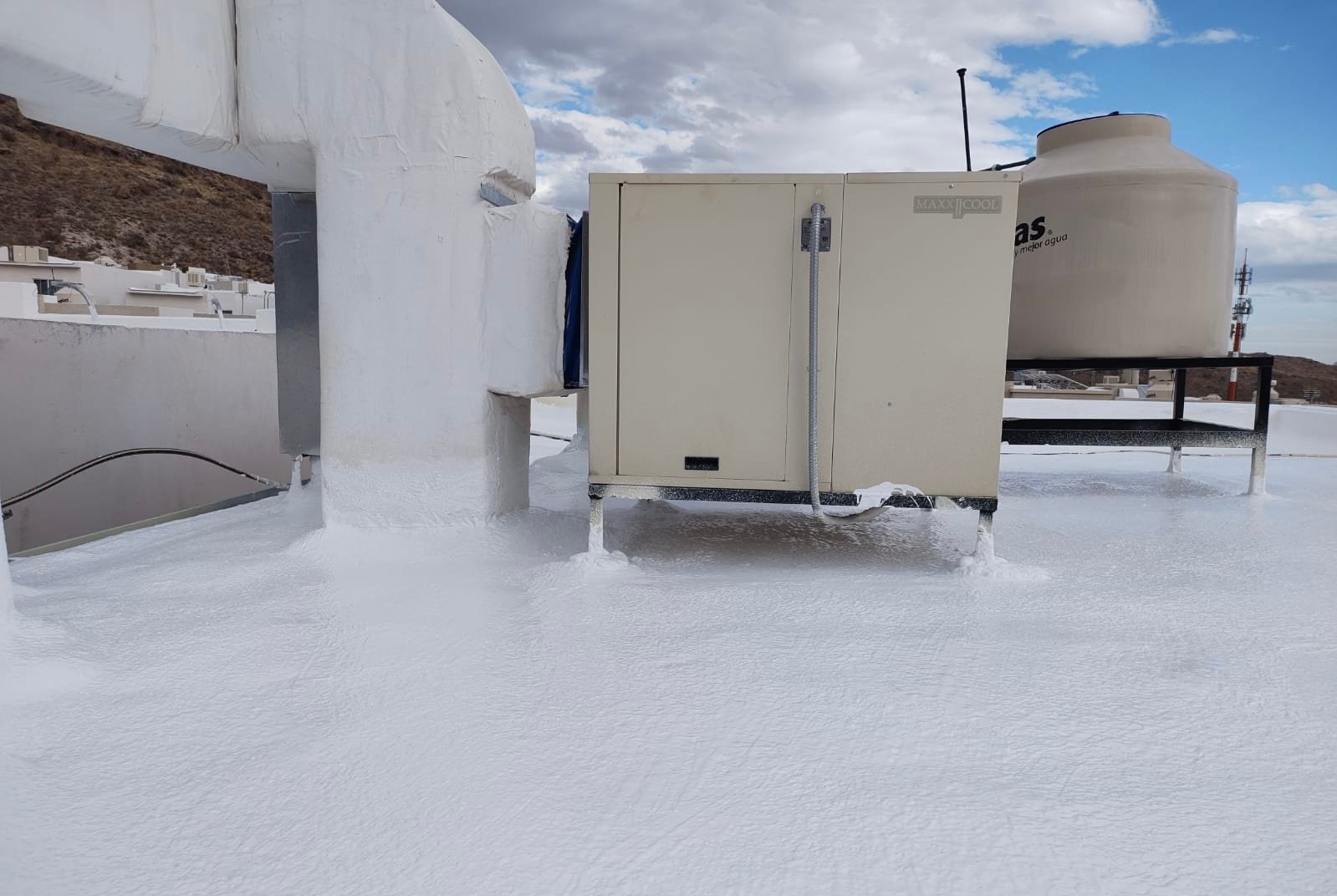 Detalle aplicación poliuretano espreado