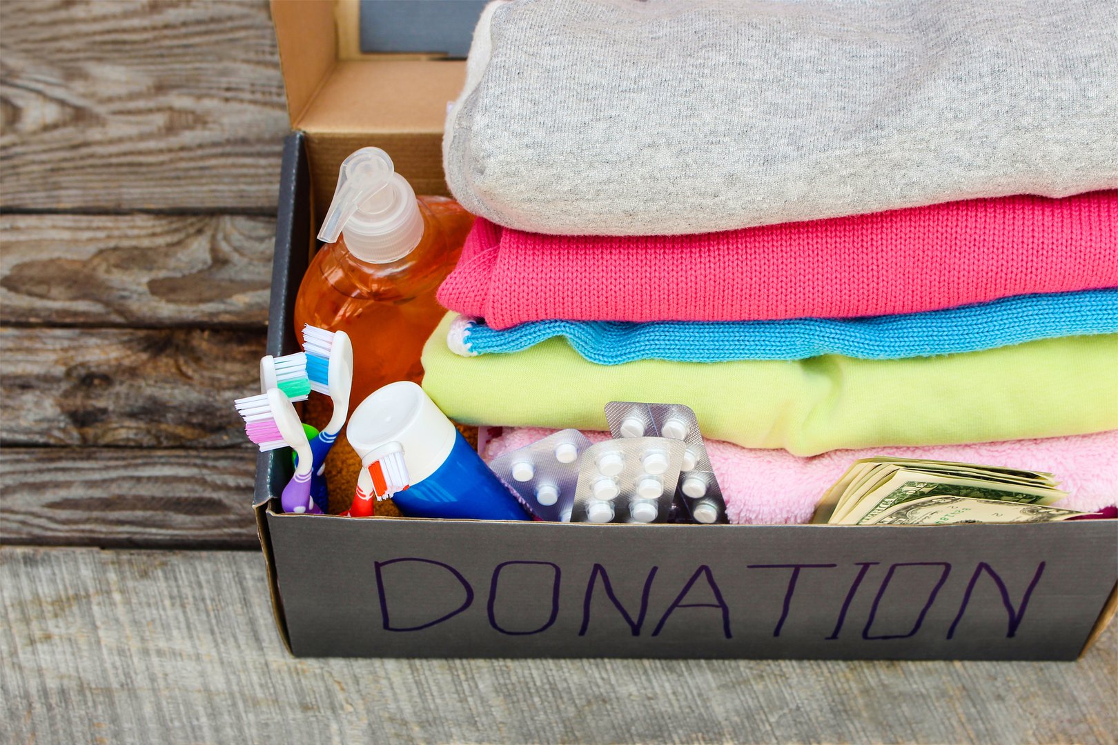 Donation box with clothes and essentials