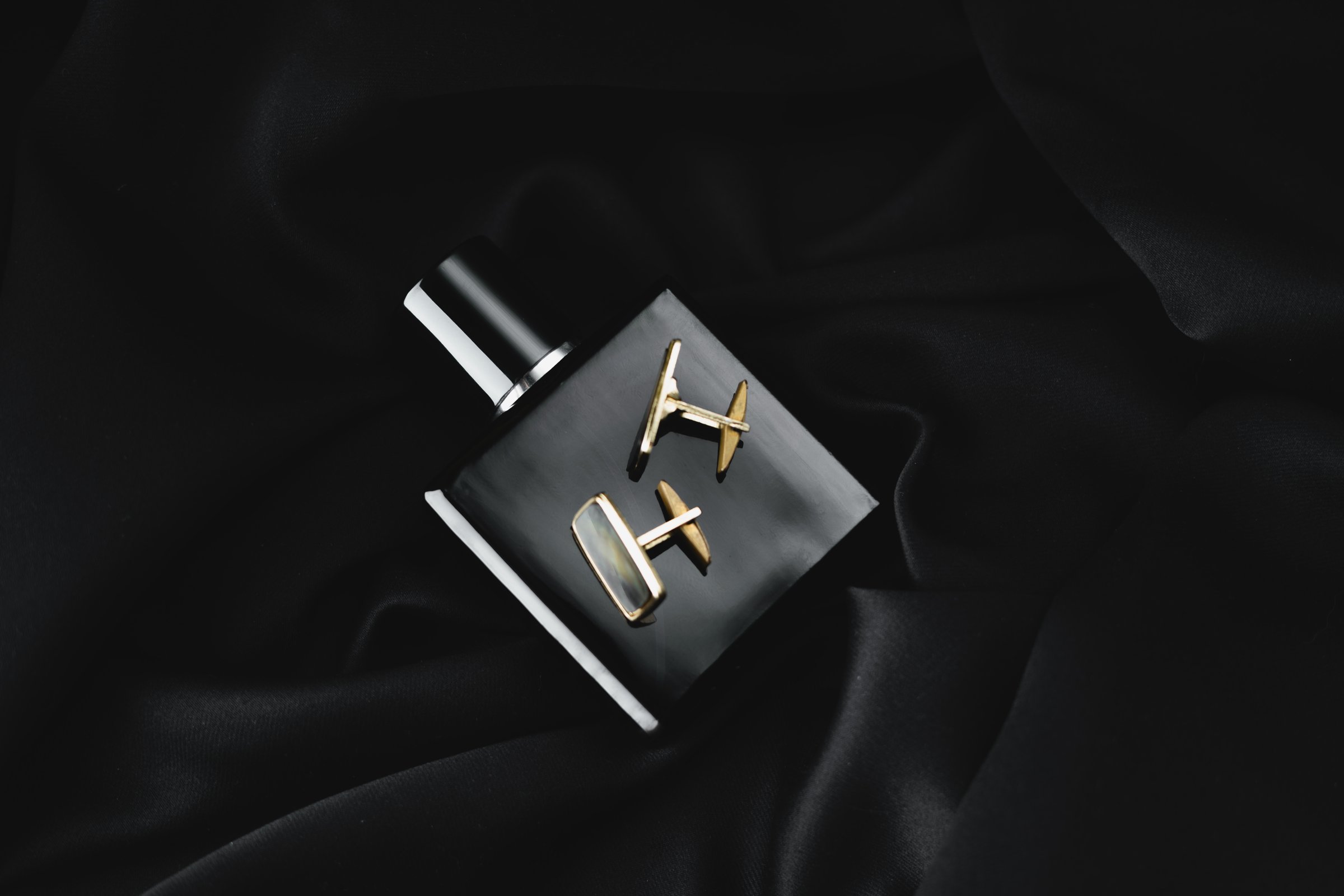 Men's Accessories. Perfume and Cufflinks. Men's Day.