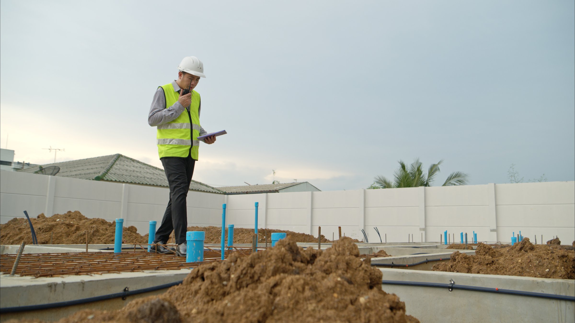 Engineers supervise construction work