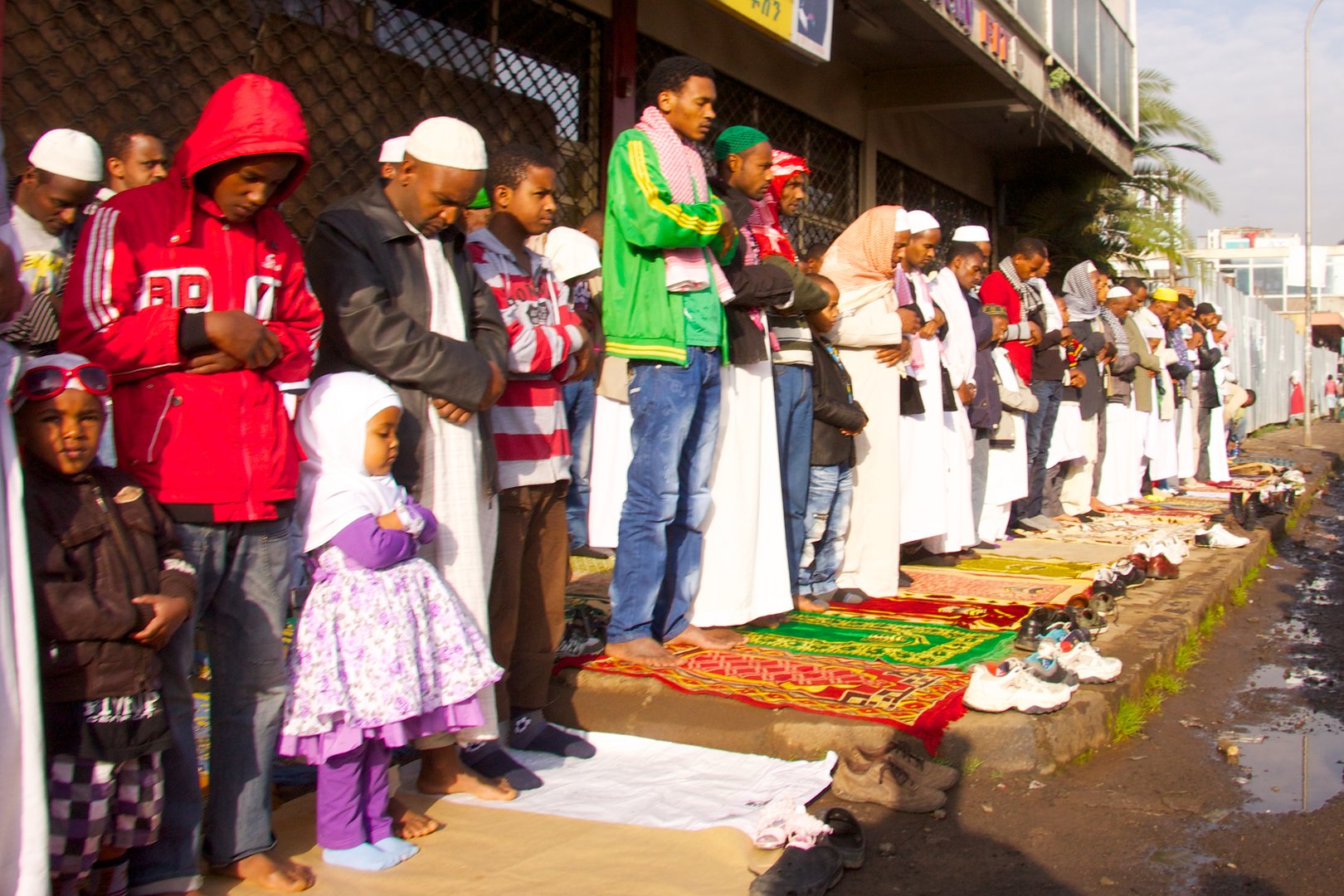 Addis Ababa, Ethiopia - August 19, 2012 : Muslim people are praying at Addis Ababa city center in Eid Ul-Fitr morning.