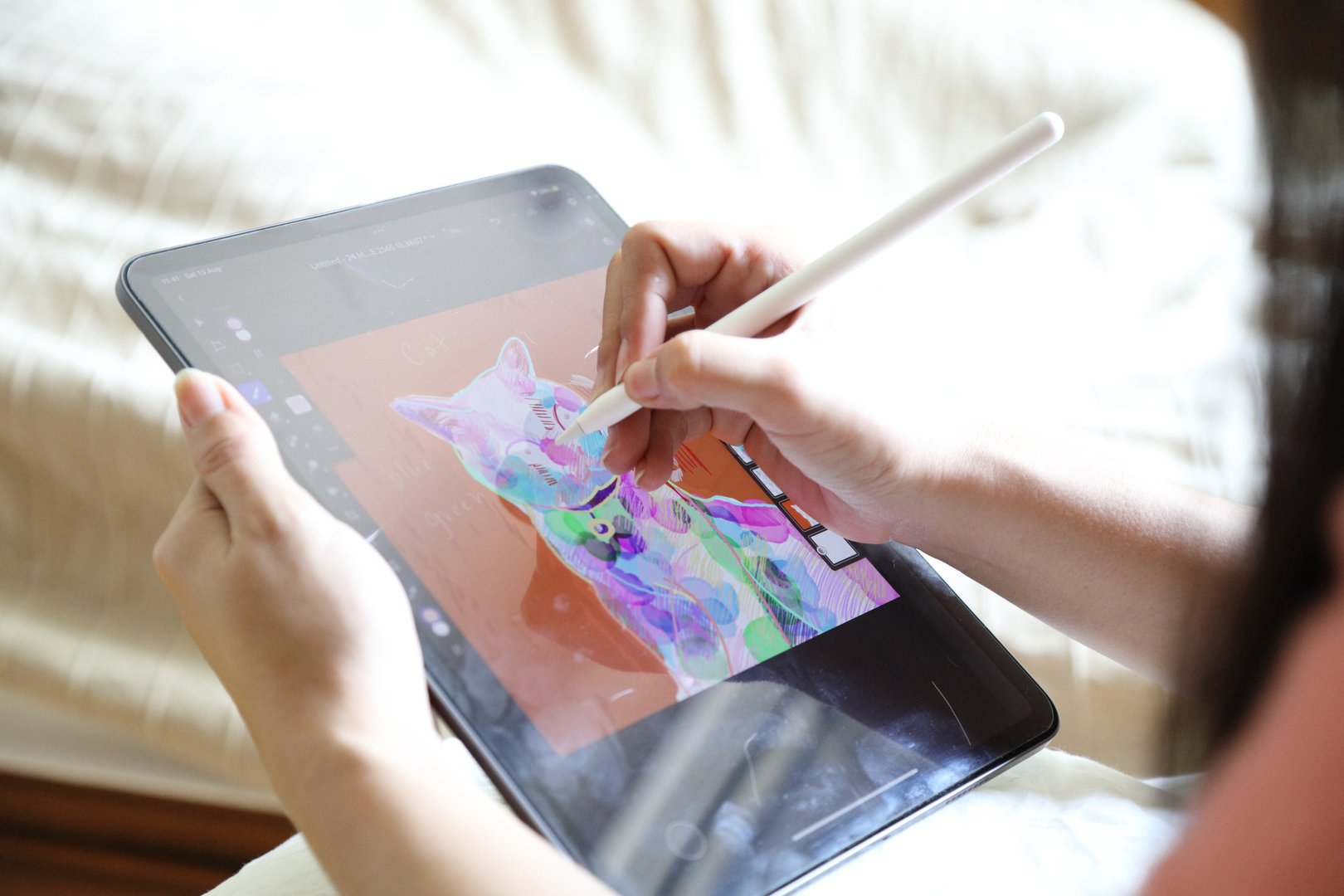 The Asian woman relaxing in the armchair in the bed room.