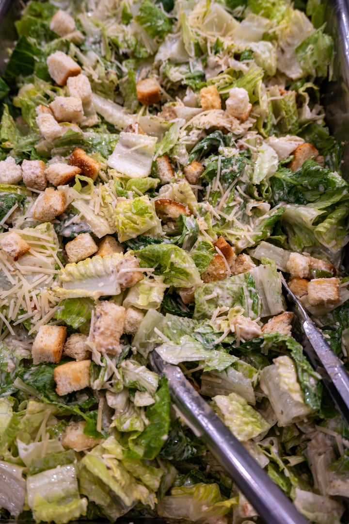 A large Caesar salad with homemade dressing and croutons