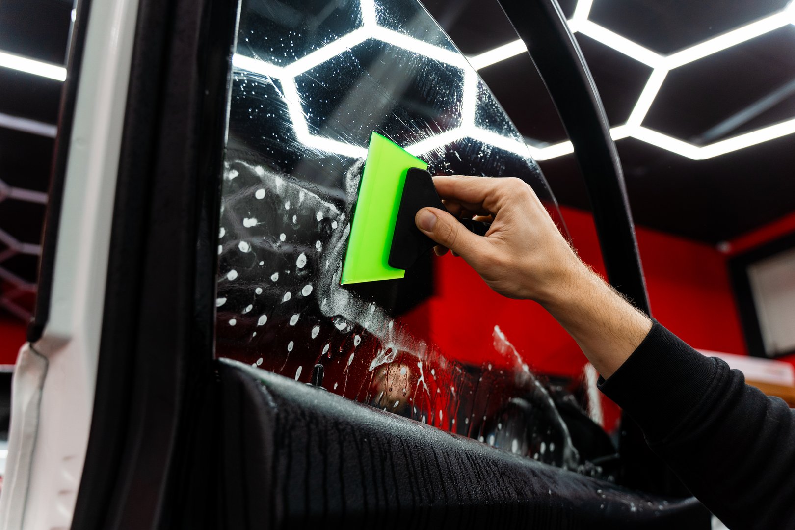Side window tint interior smoothing prevents air bubbles and maintains flawless adhesion. Plastic squeegee interior smoothing eliminates wrinkles and bubbles on side window tint.
