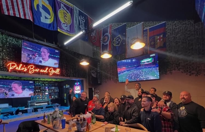 Community gathering at Pakos Bar and Grill