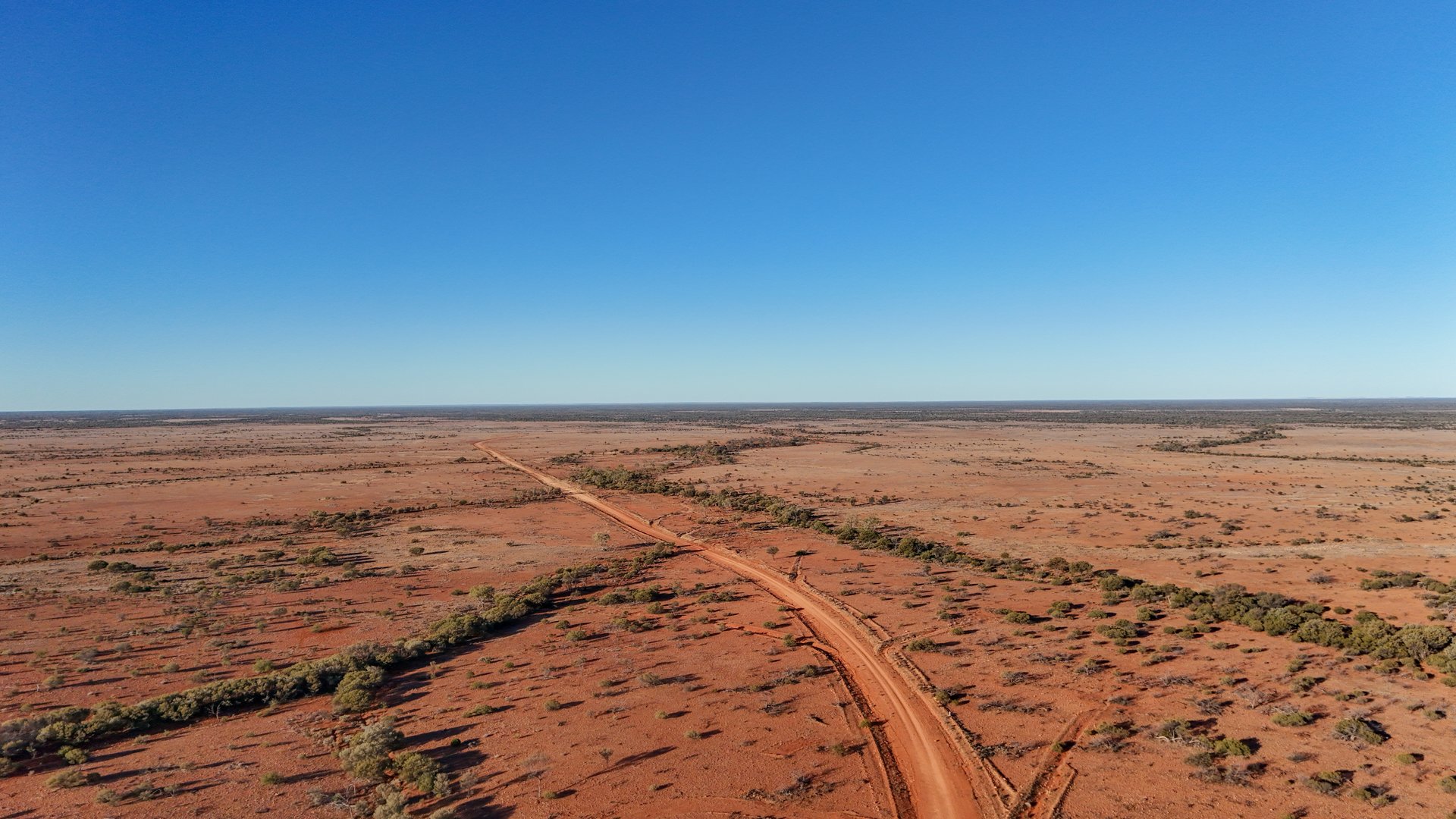 Aerial views of Cameron's Corner Road passing through outback Queensland