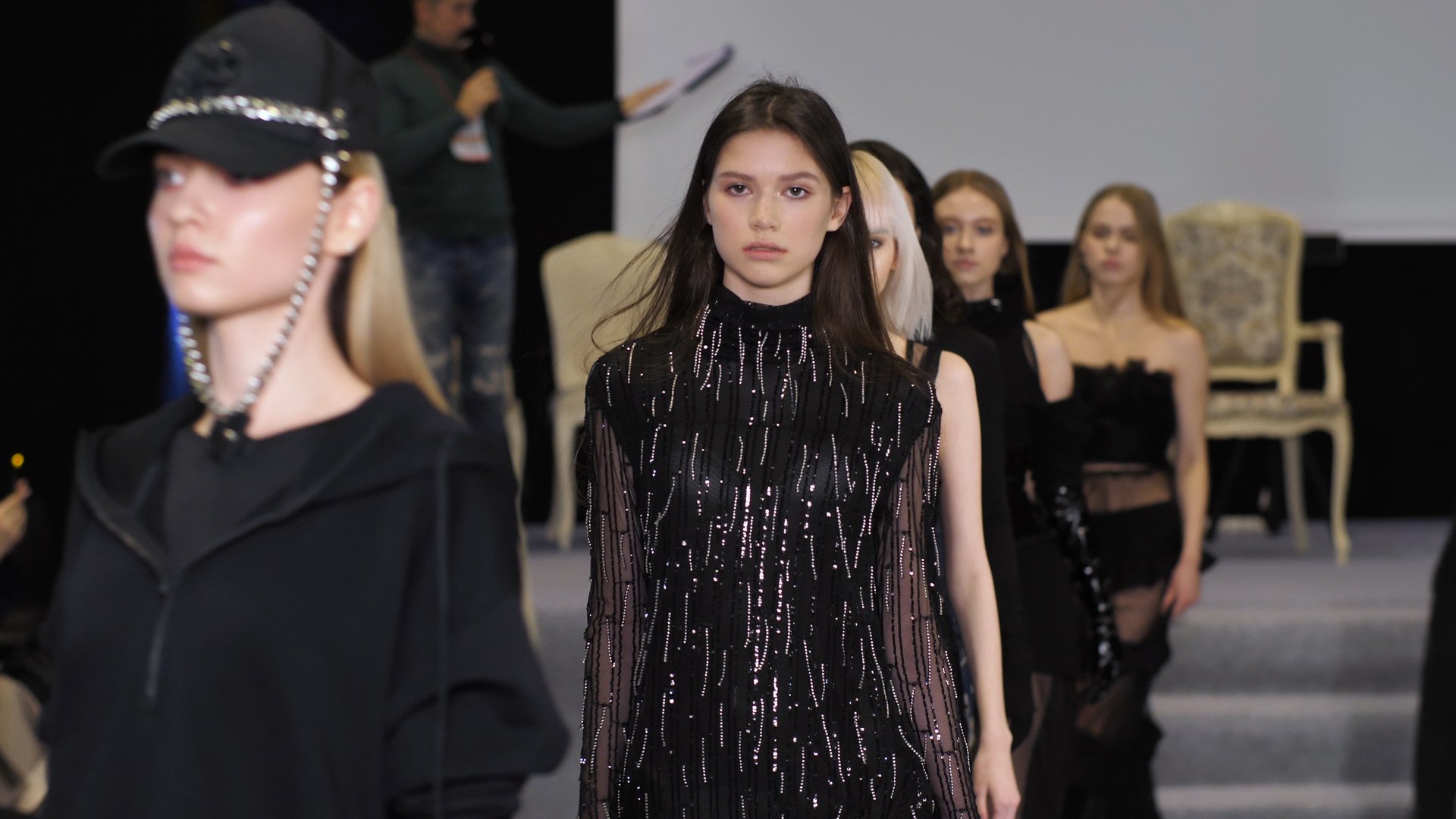 Stylish glamour girls move on pricy podiums during classy fashion showing weeks. Models defile on catwalk stage show. Young adult women walk in trendy clothing. Popular females on famous runways 4K.