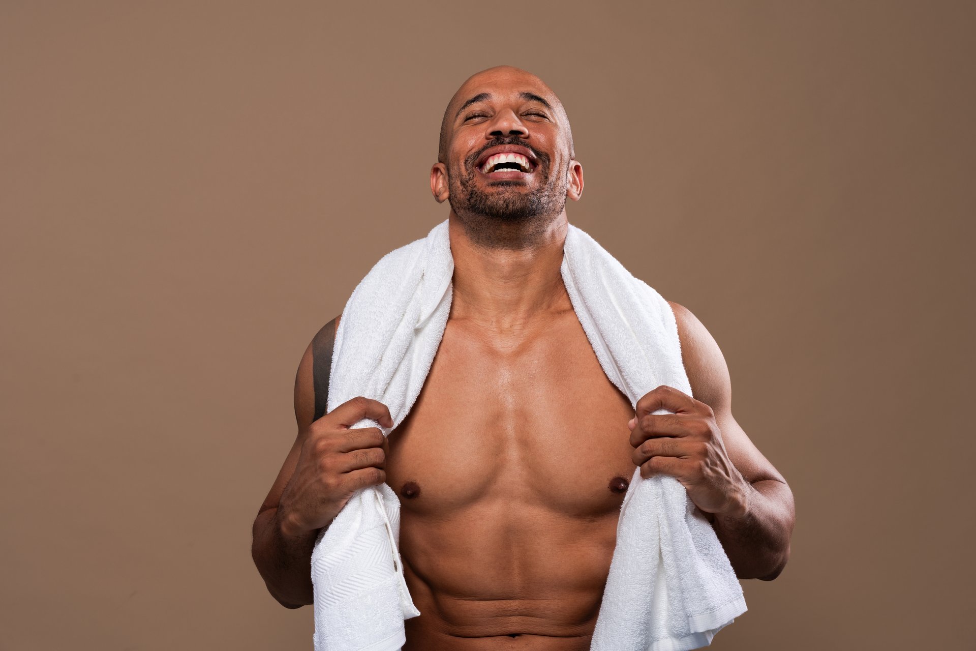 Beauty portrait of middle-aged hispanic black handsome man on colored background, concepts about beauty treatment, skincare and cosmetics for men