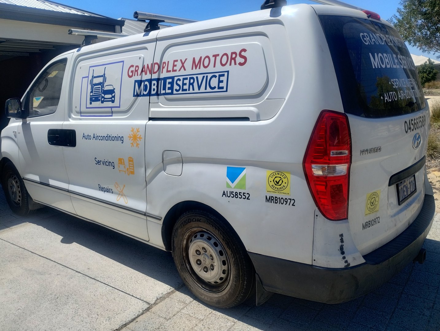 Close up hand of Mechanics inspect and check the refrigerant and fill the car air conditioner. Worker service car air conditioner.