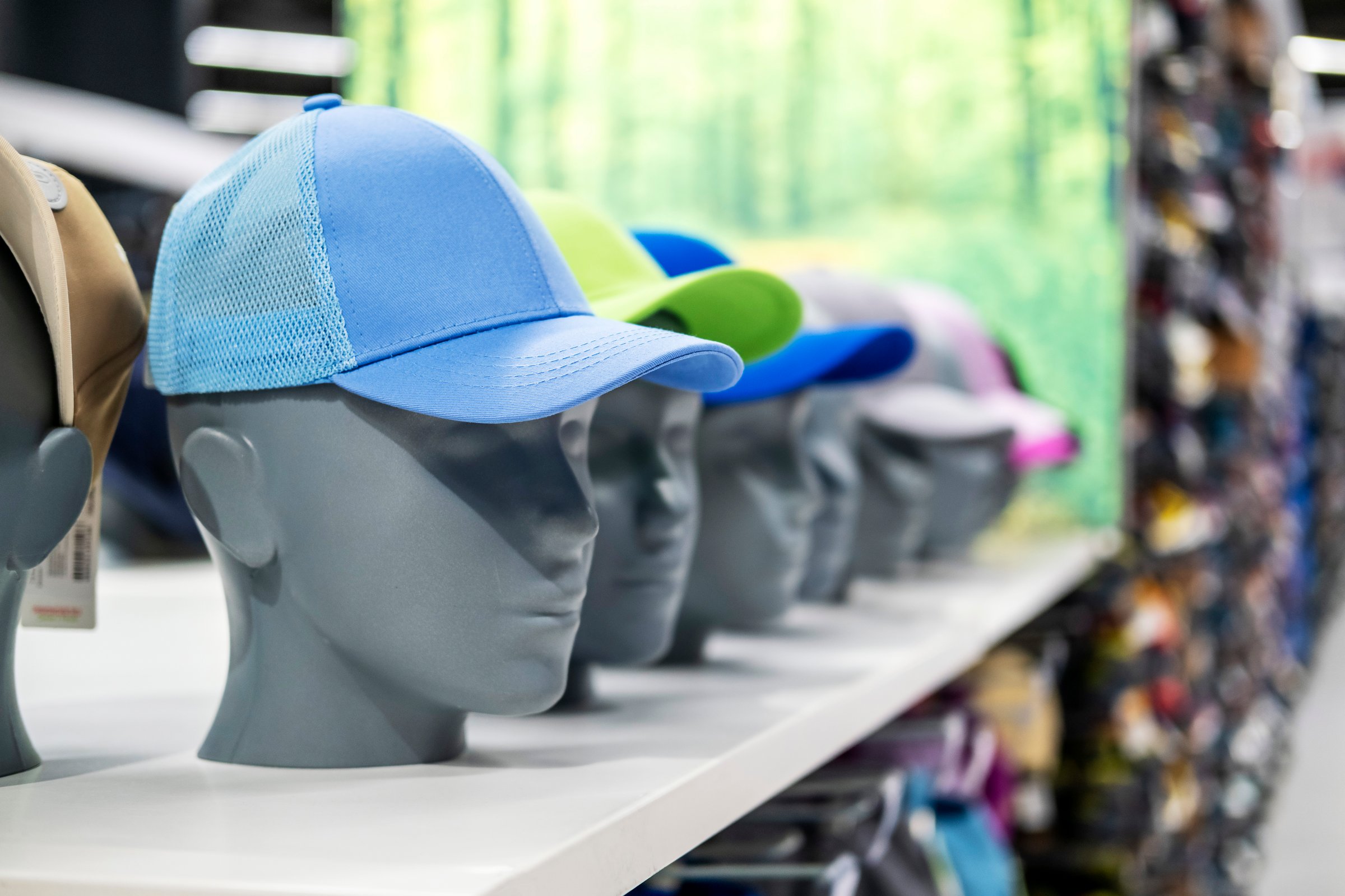 hats of different colors, for protection from the sun, large selection in the store