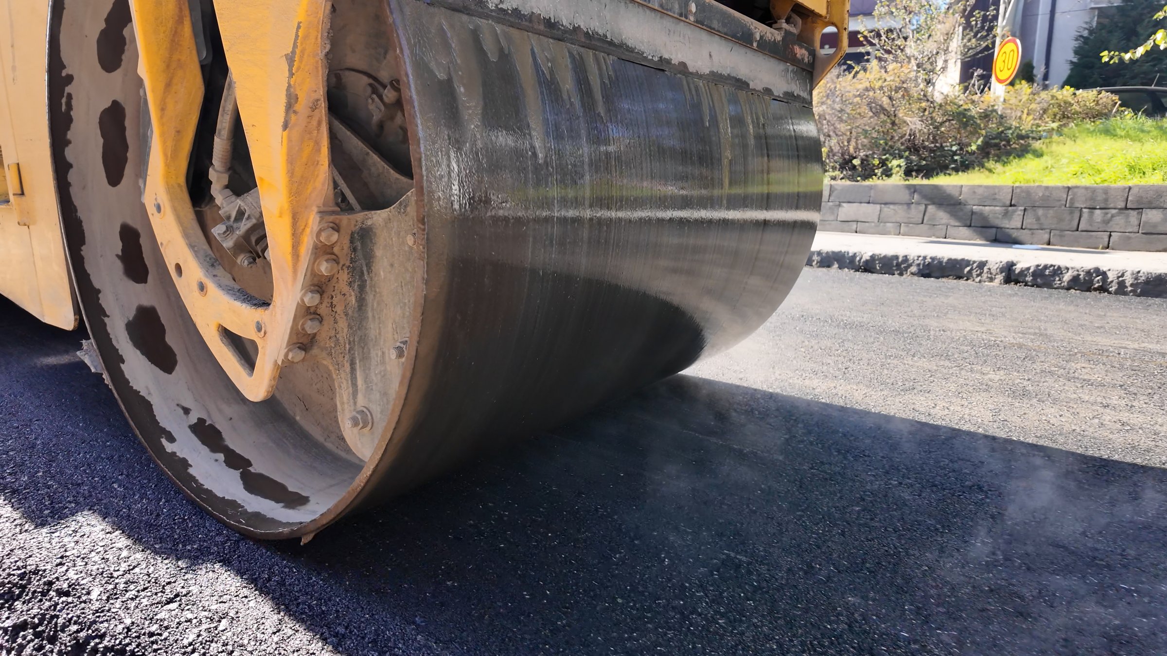 Public city street reconstrunction with heavy machines.