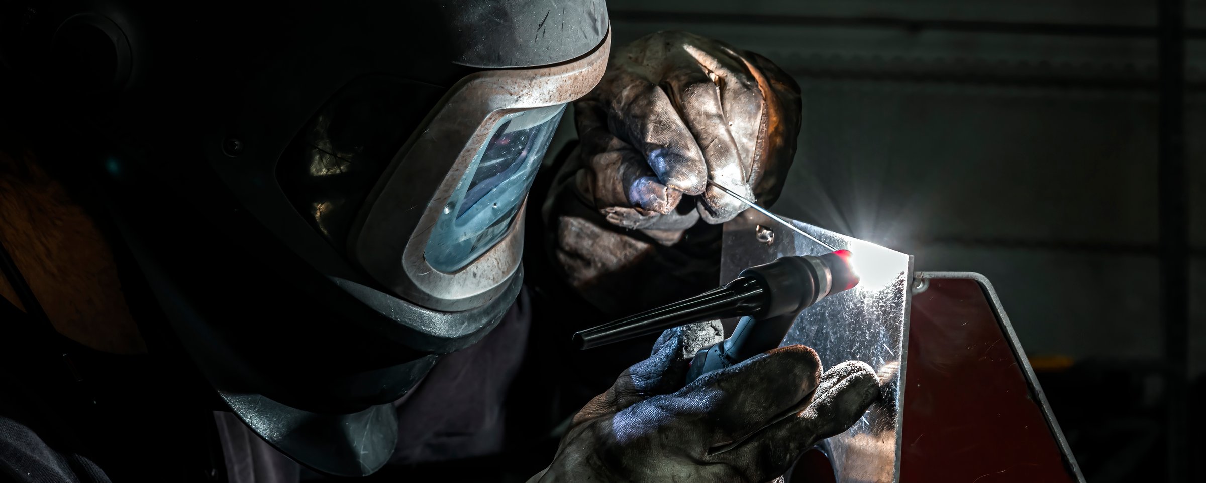 welder at work in a workshop, France