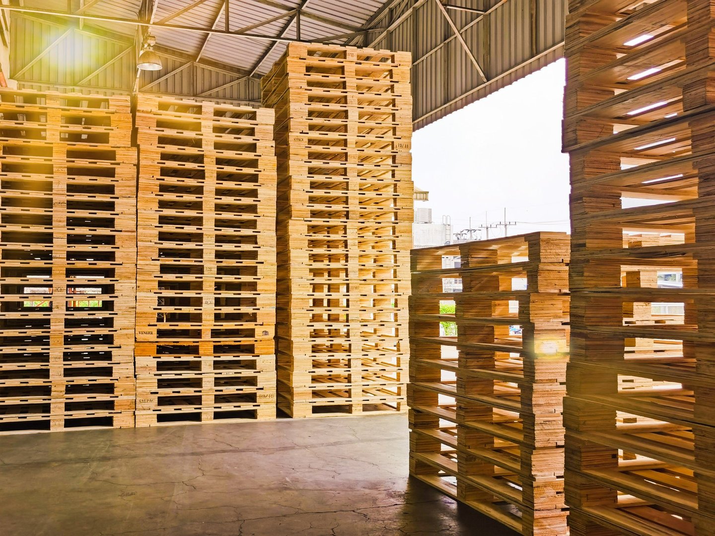 Wooden pallets stack at the freight cargo warehouse for transportation and logistics industrial