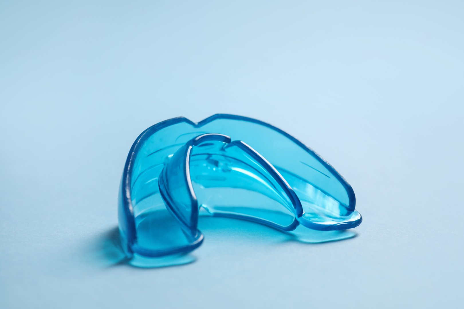 Dental mouth guard on light blue background